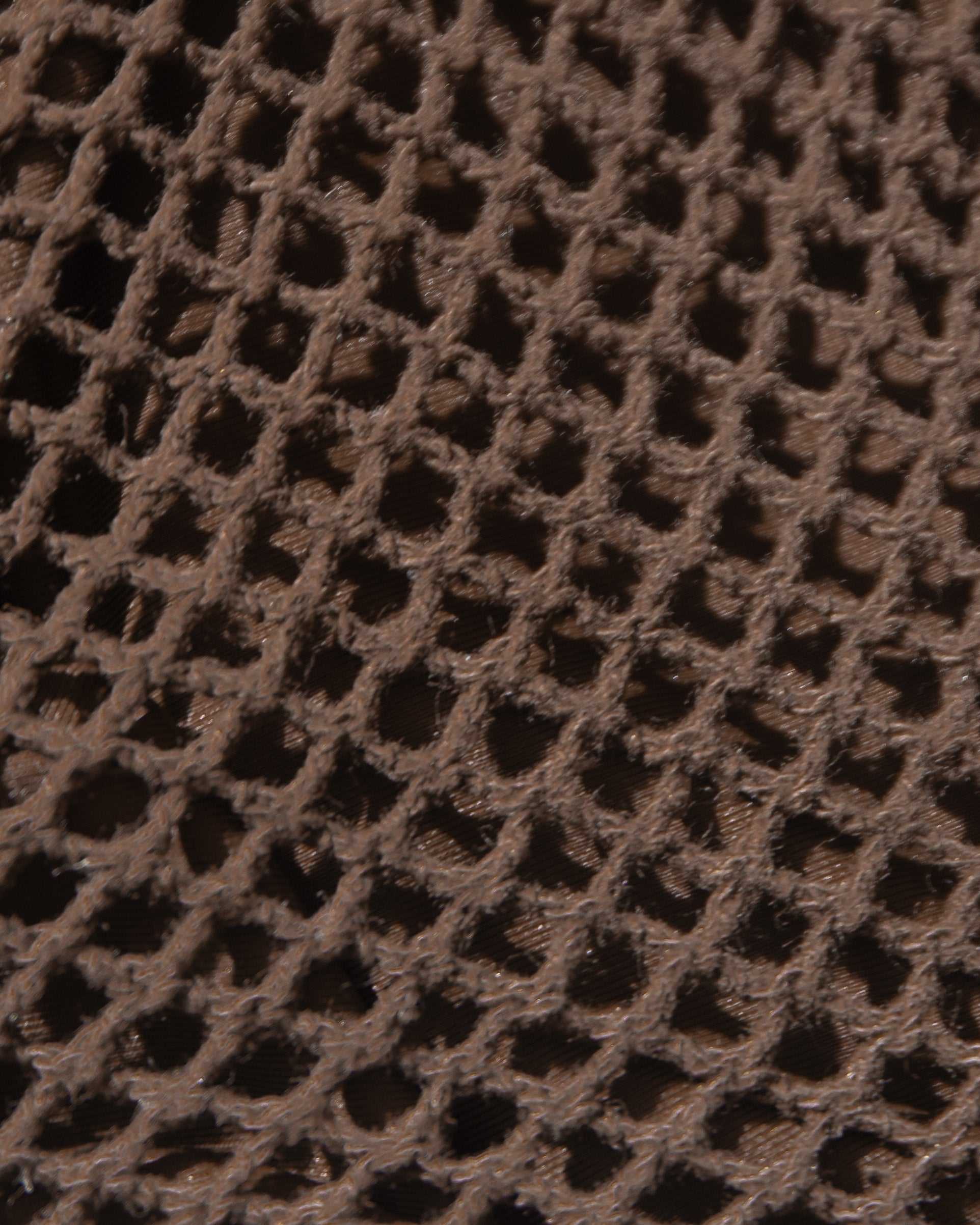 Aspen Bikini Top - Espresso Close-up detail of the LSPACE espresso Aspen Bikini Top, showing the open diamond-weave mesh fabric texture.