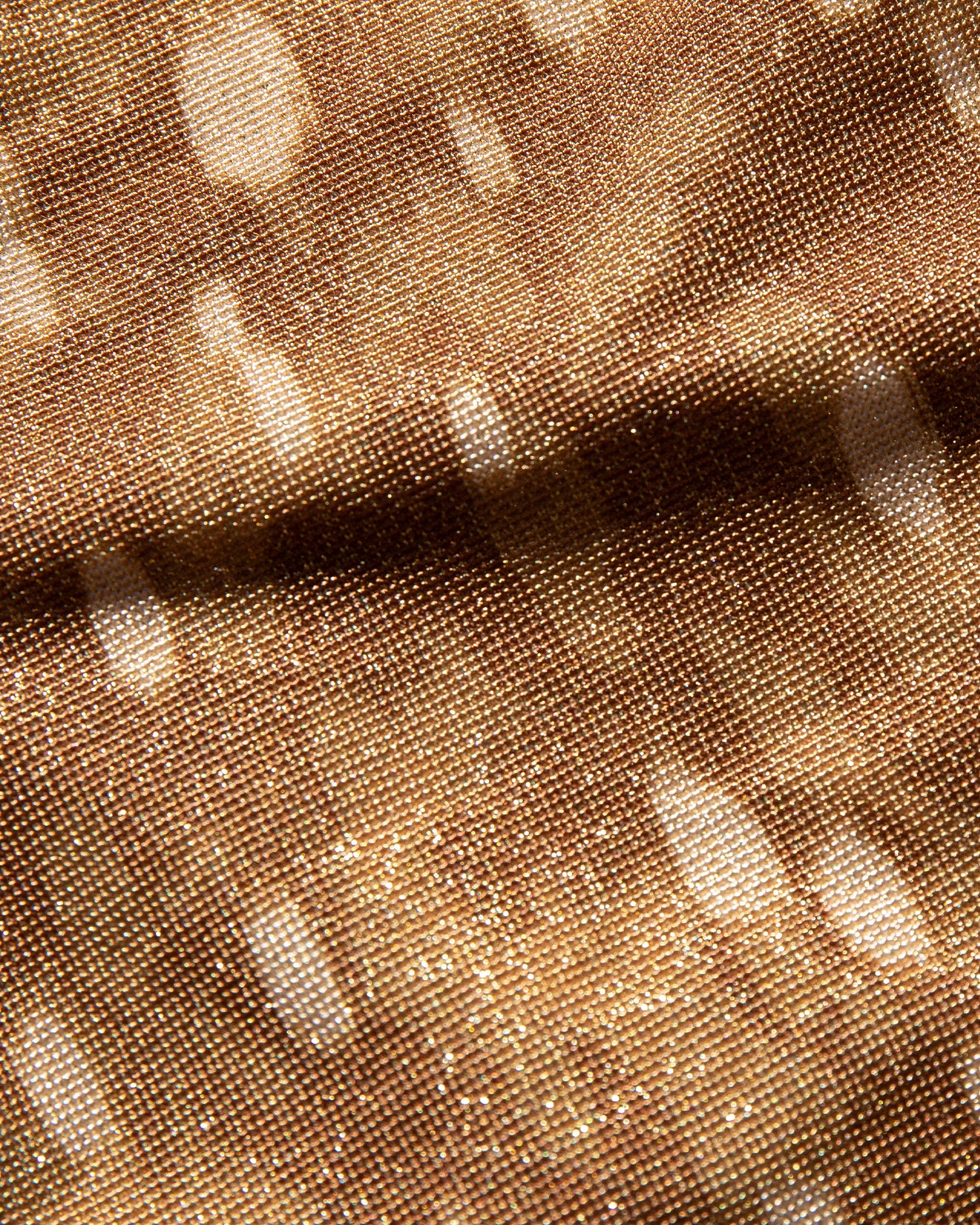 Caliente Short - Fawny Business Close up image of the Fawny Business fabric showing the lurex shine.