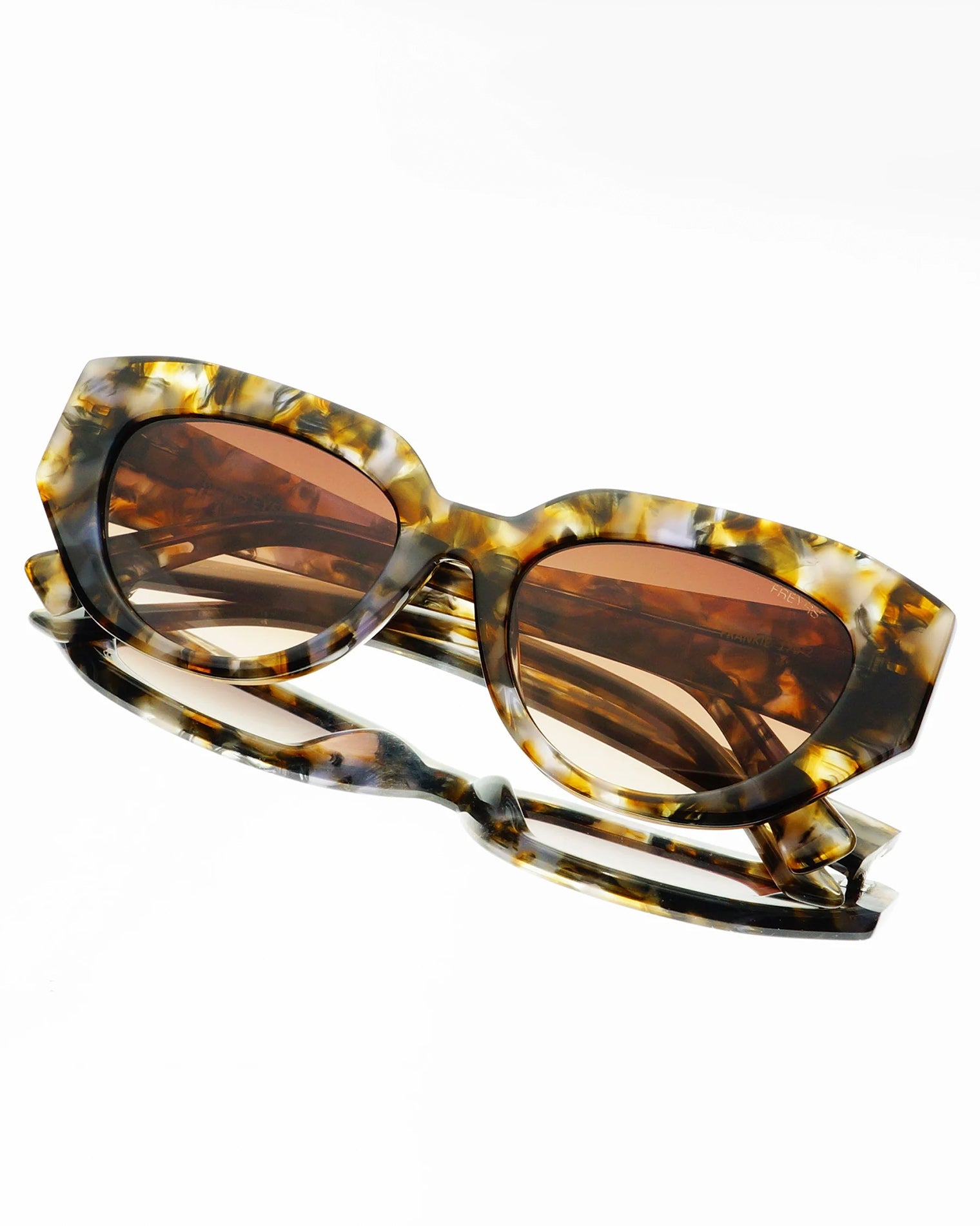Freyrs Frankie Sunglasses - Brown Close-up detail of the Freyrs Frankie Sunglasses in brown showing frame and lens construction.