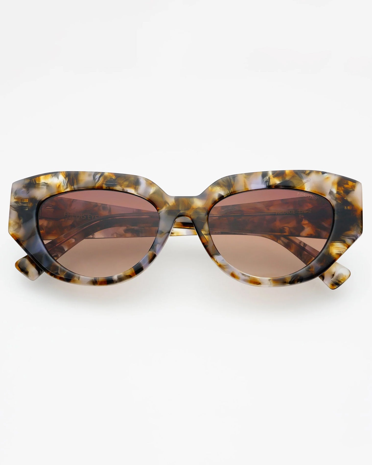 Freyrs Frankie Sunglasses - Brown Off-model image of the Freyrs Frankie Sunglasses in brown, folded flat with chunky brown tortoise acetate frame and brown gradient lenses.