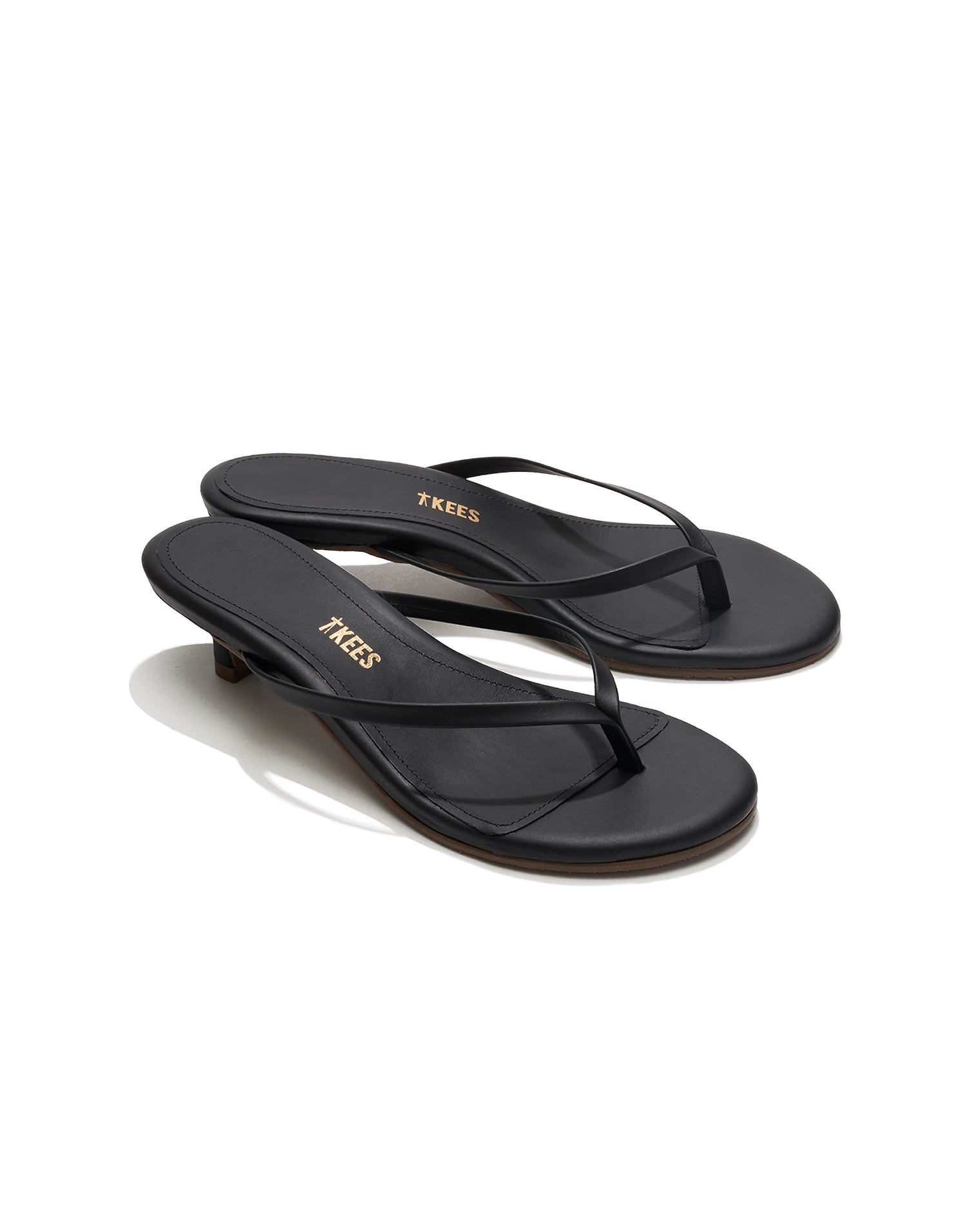 TKEES Julia Kitten Heel - Sable Angled side view of a single black sable leather TKEES Julia Kitten Heel sandal showing the kitten heel.
