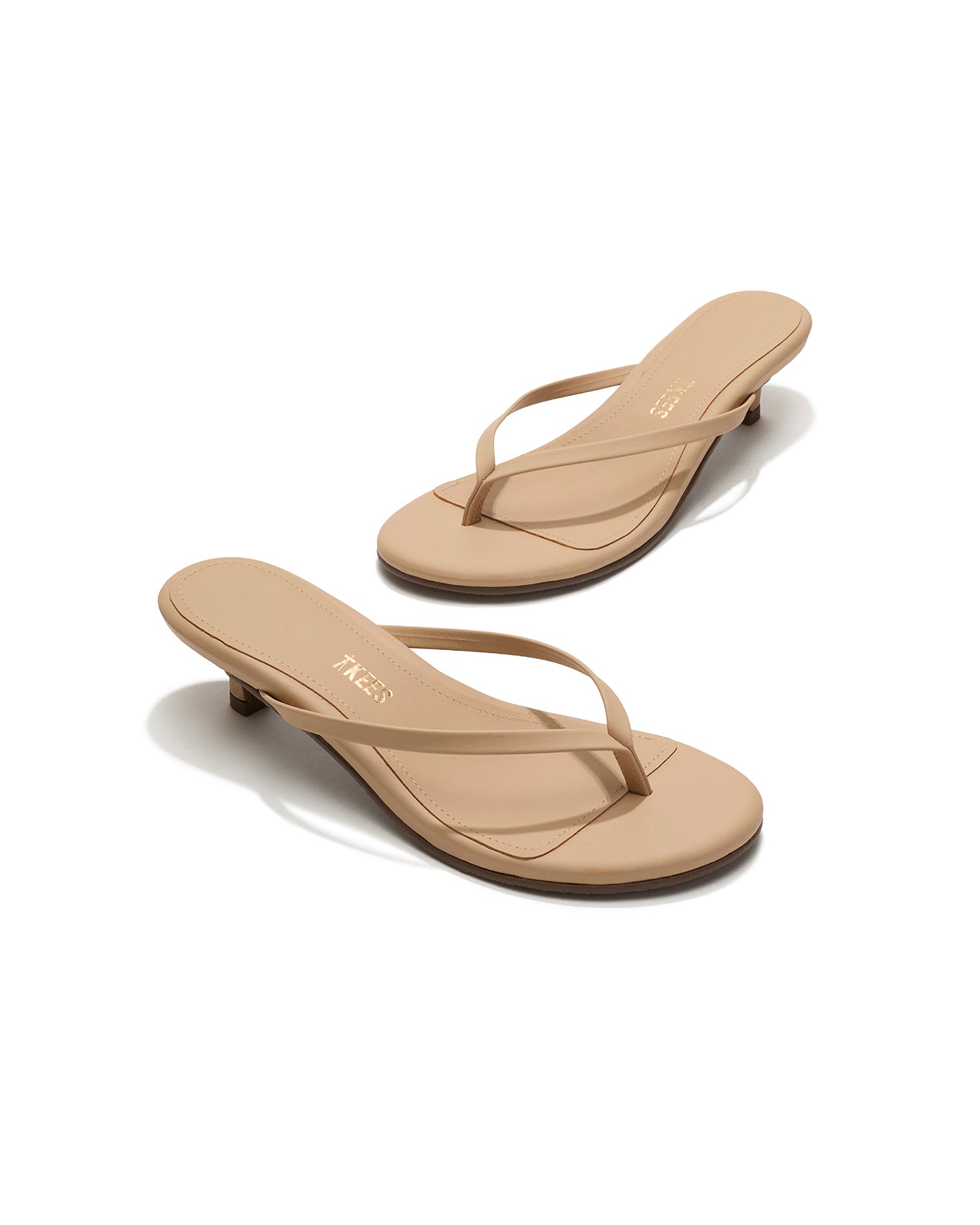 TKEES Julia Kitten Heel - Sunkissed Angled view of both sunkissed nude leather TKEES Julia Kitten Heel thong sandals.