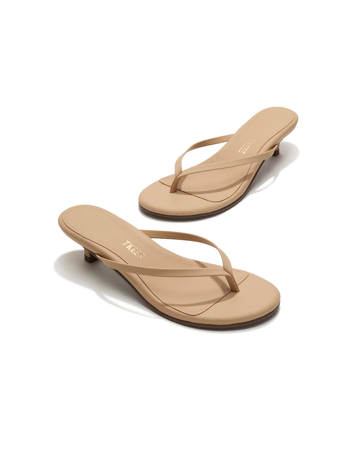 TKEES Julia Kitten Heel - Sunkissed Angled view of both sunkissed nude leather TKEES Julia Kitten Heel thong sandals.