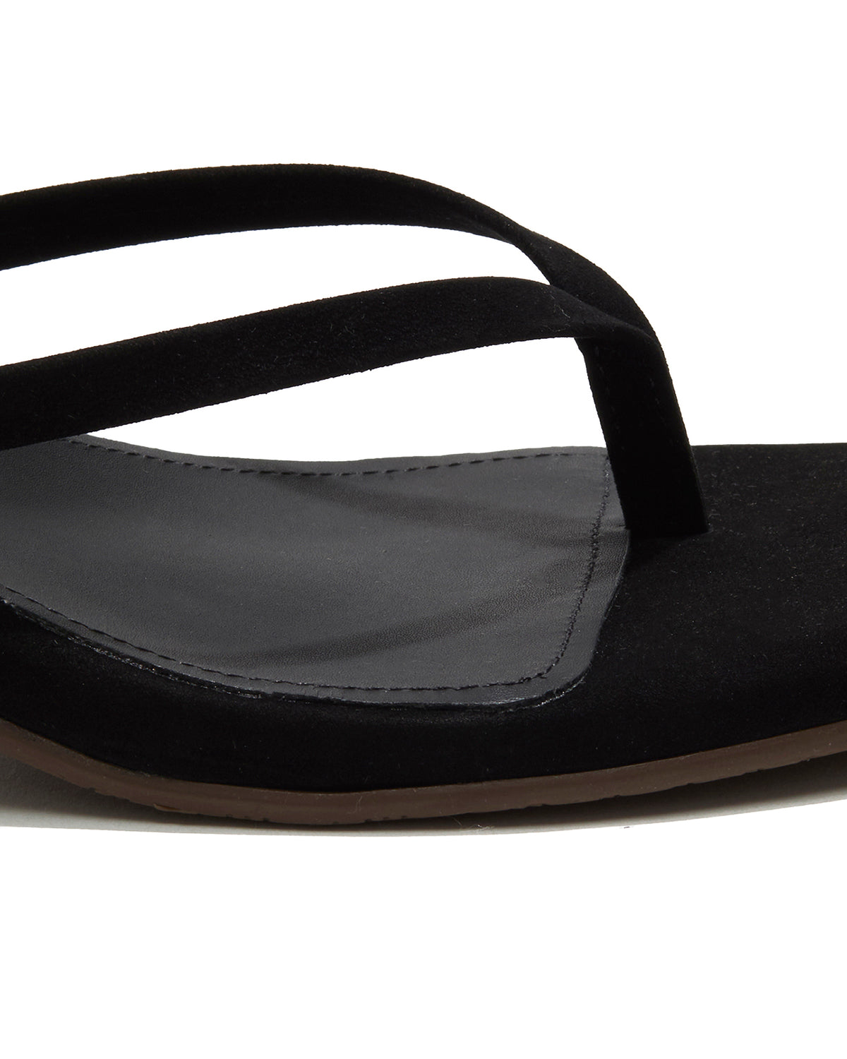 TKEES Square Toe Julia Suede - Black Close-up of the black suede thong strap and square-toe footbed on the TKEES Square Toe Julia Suede.