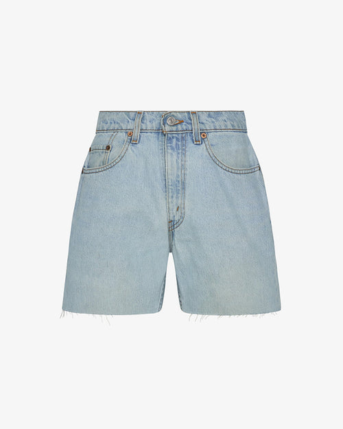 Off-model view of the aligrace Long Baggy Short in light wash, showing a relaxed-fit denim short with a raw frayed hem.