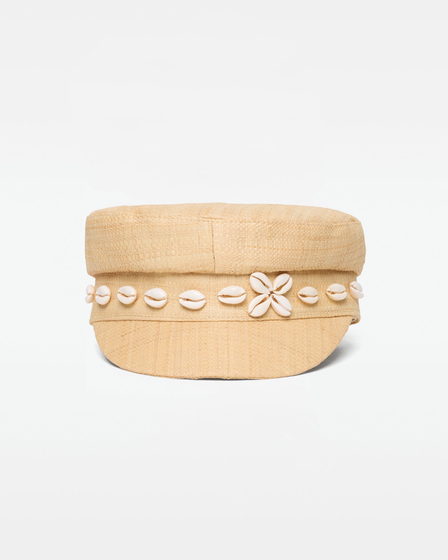 Alfama Cap - Natural Off-model front view of the Alfama Cap in natural showing the cowrie shell band trim with a flower motif, on a white background.