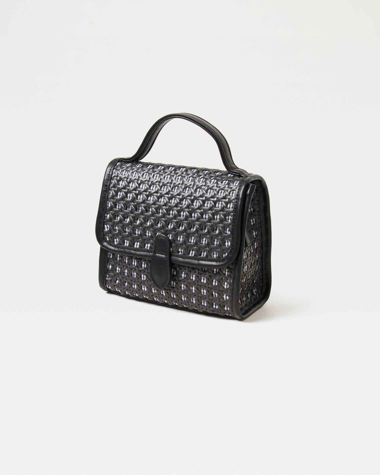 Amelia Bag - Black Front view of the Amelia Bag in black showing the woven raffia texture and flap closure.