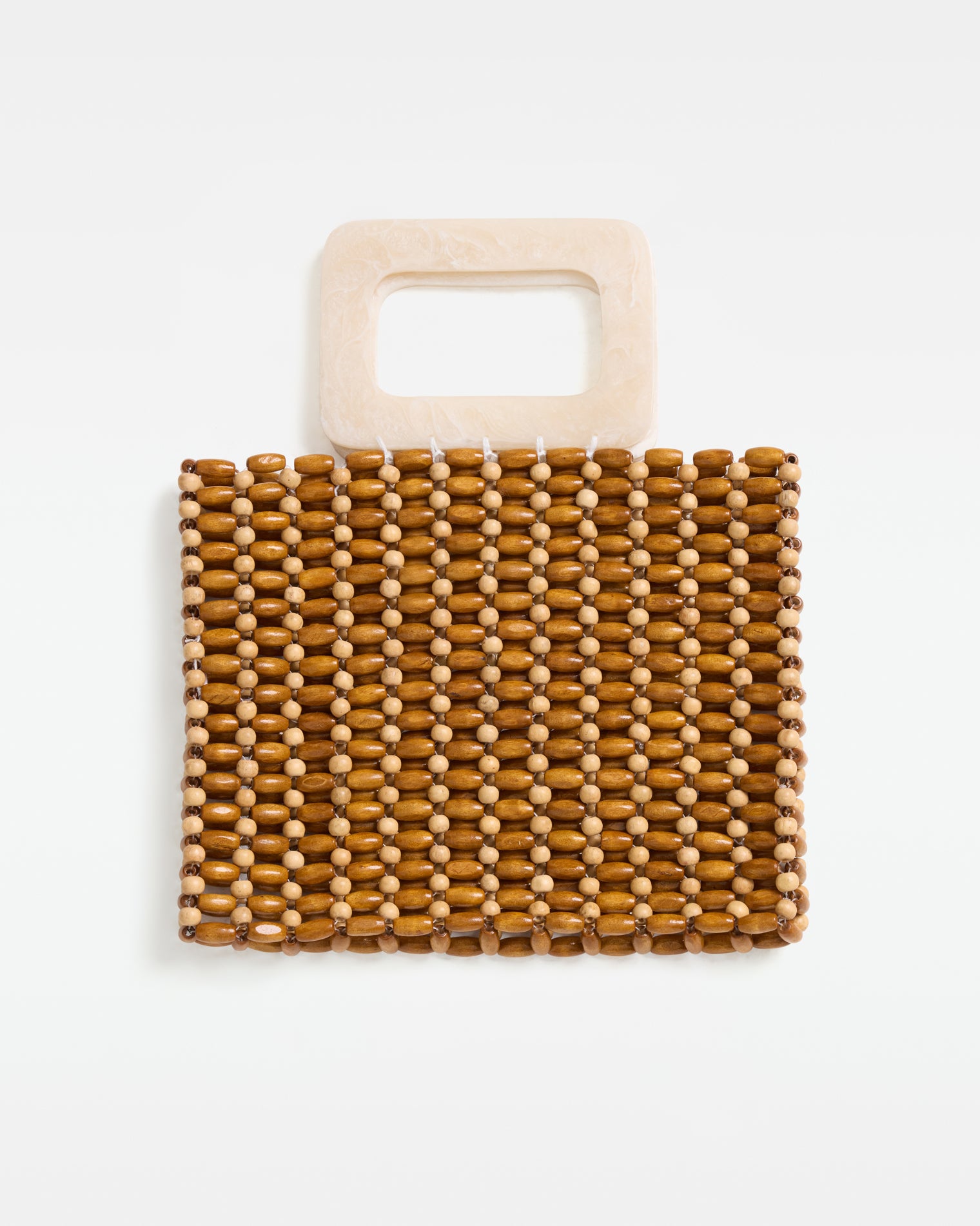 Chiado Bag - Walnut-Natural Off-model front view of the Chiado Bag in walnut-natural, a structured beaded tote bag with alternating walnut and natural wood beads and a cream acrylic top handle, on a white background.