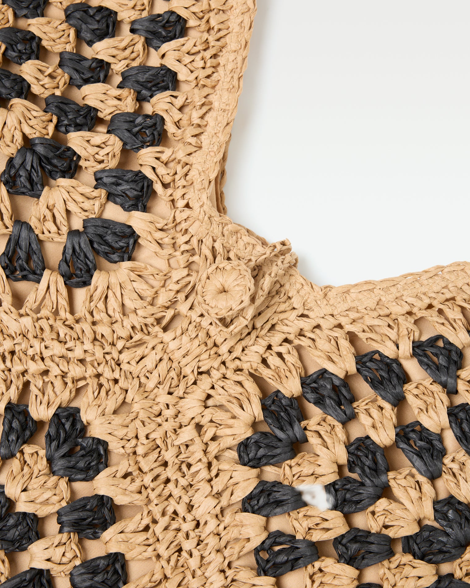 Coastline Beach Bag - Natural Black Close-up of the crochet texture detail on the natural black Coastline Beach Bag.