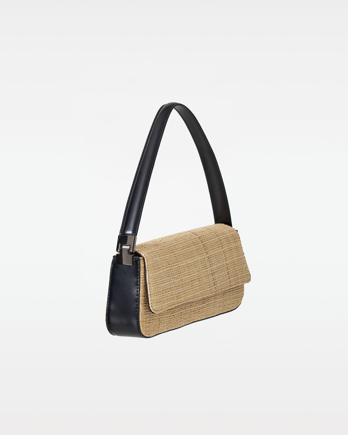 Comporta Bag - Natural-Black Off model image of the Comporta Bag, showing the leather side.