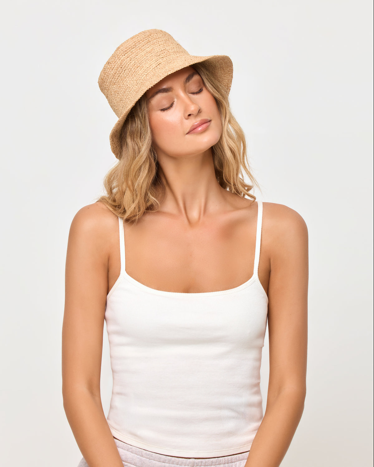 Isadora Bucket Hat - Natural-Petite LSPACE Isadora bucket hat in natural, close-up detail view on model.