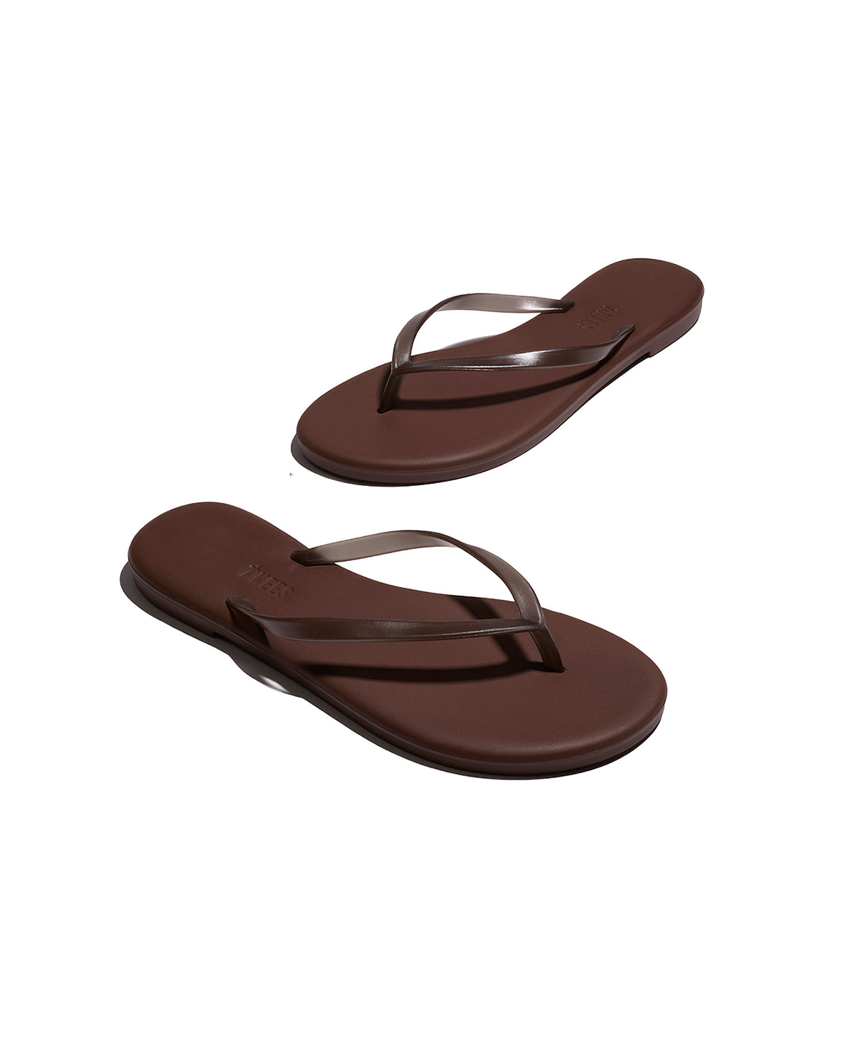 TKEES Aqua Sandals - Brown Angled view of both brown TKEES Aqua Sandals showing the sole and side profile.