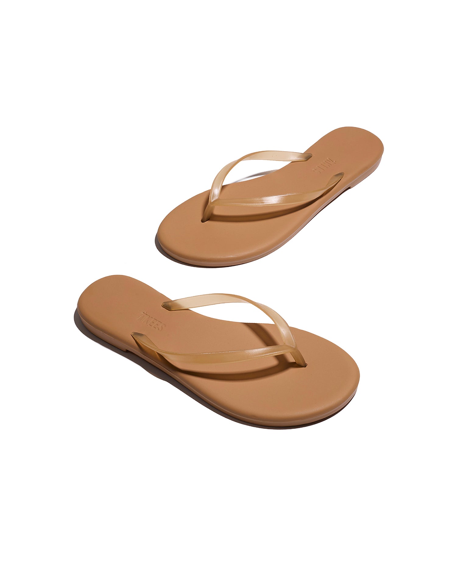 TKEES Aqua Sandals - Tan Angled view of both tan TKEES Aqua Sandals showing the sole and side profile.