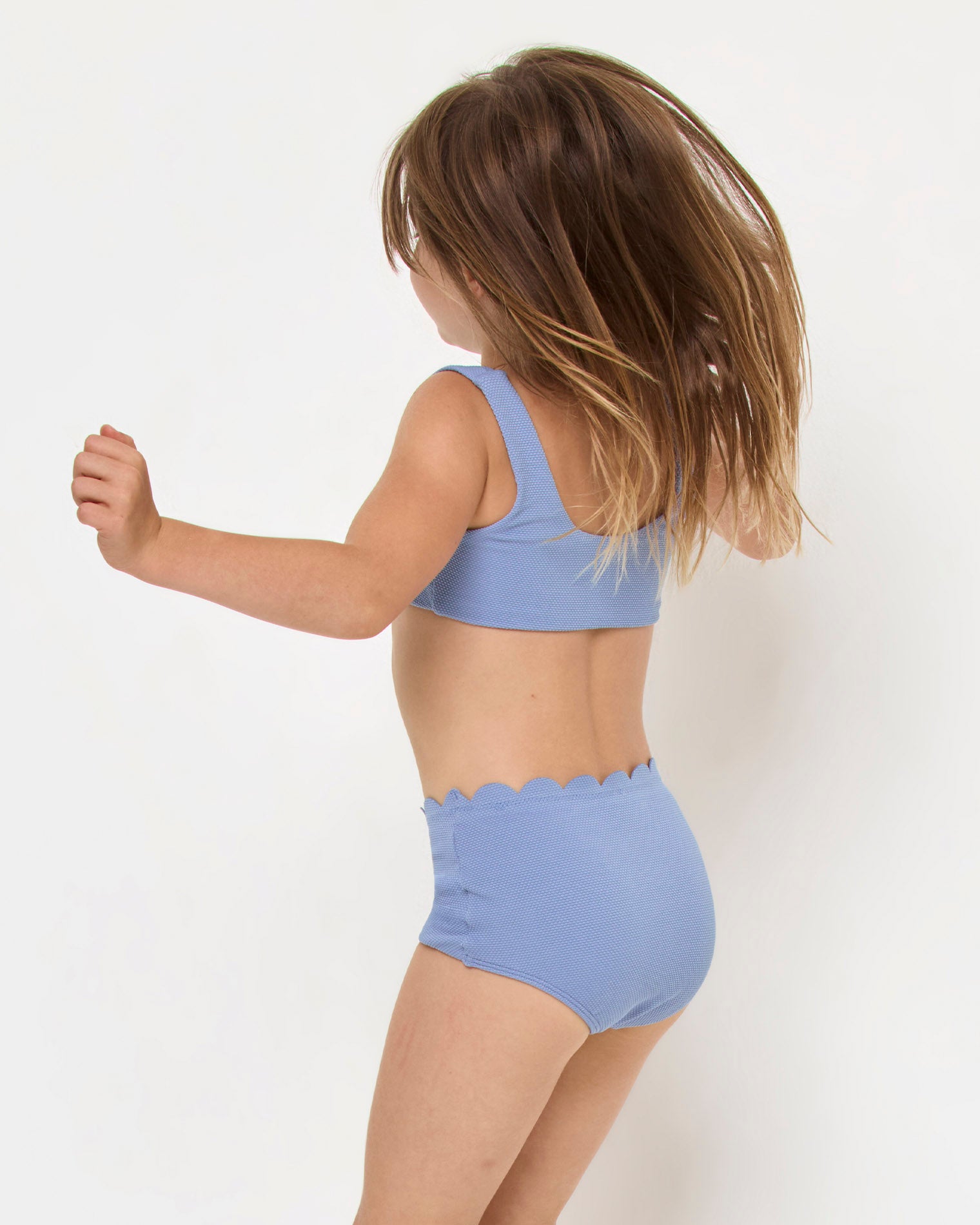 Seashell Swirl Set - Chambray LSPACE Seashell Swirl set in chambray, back view on model.