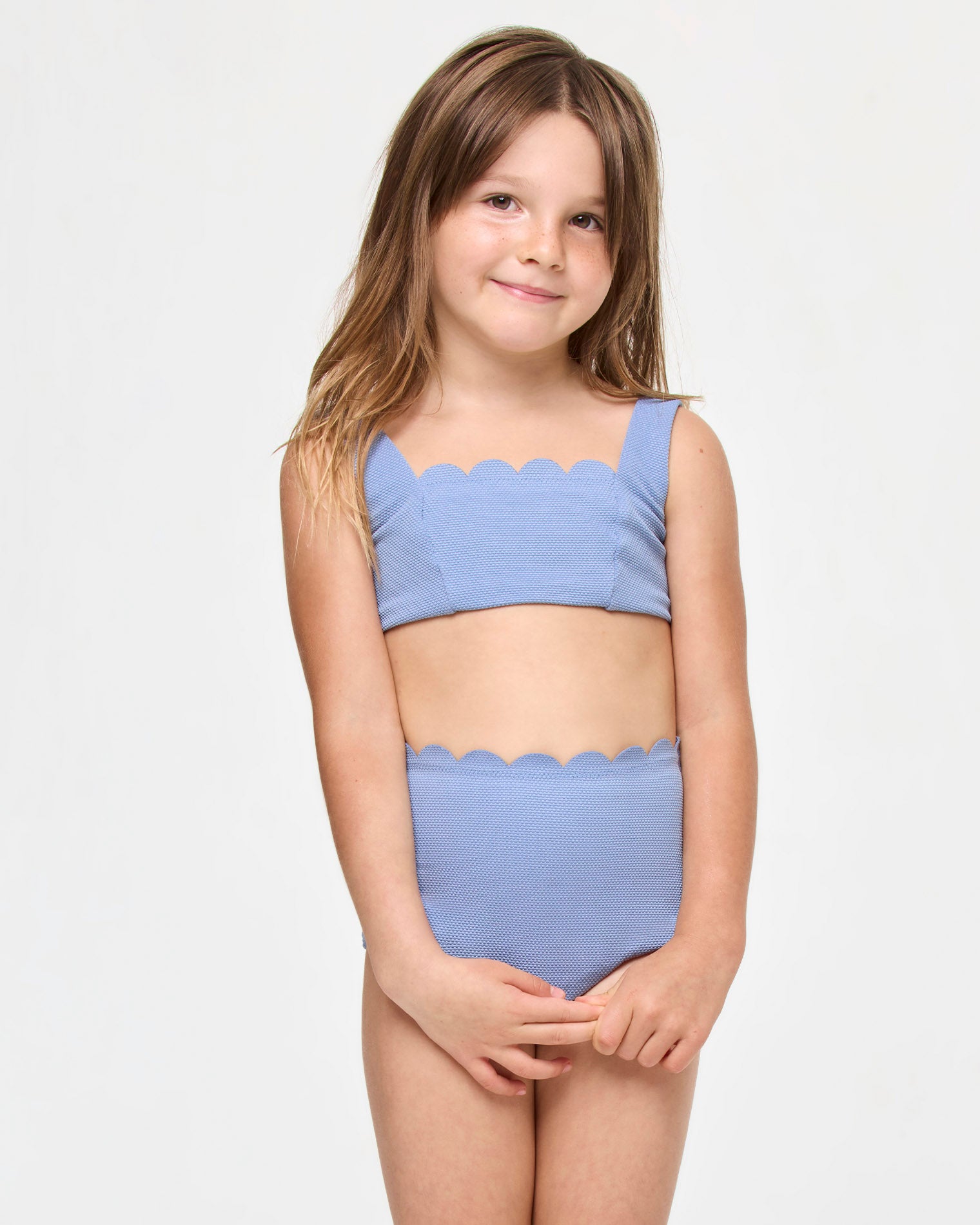 Seashell Swirl Set - Chambray LSPACE Seashell Swirl set in chambray, front view on model.