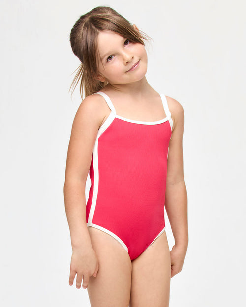 LSPACE Beach Skipper one piece in Pout-Cream, three-quarter view on model.