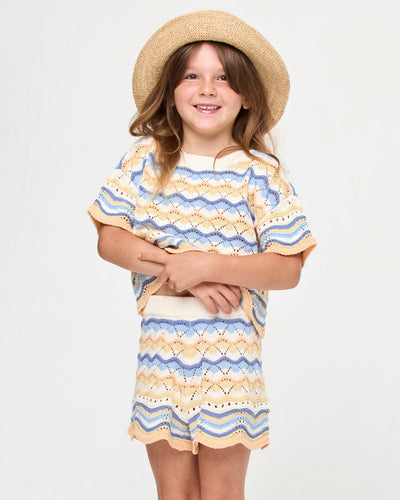 LSPACE Isadora mini bucket hat in natural, front view on model.