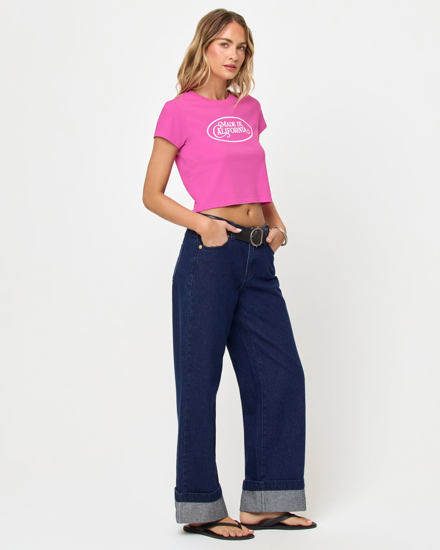 Merci Baby Tee - Made In California Sweetheart Side view of model wearing the Merci Baby Tee in Sweetheart Made in California.