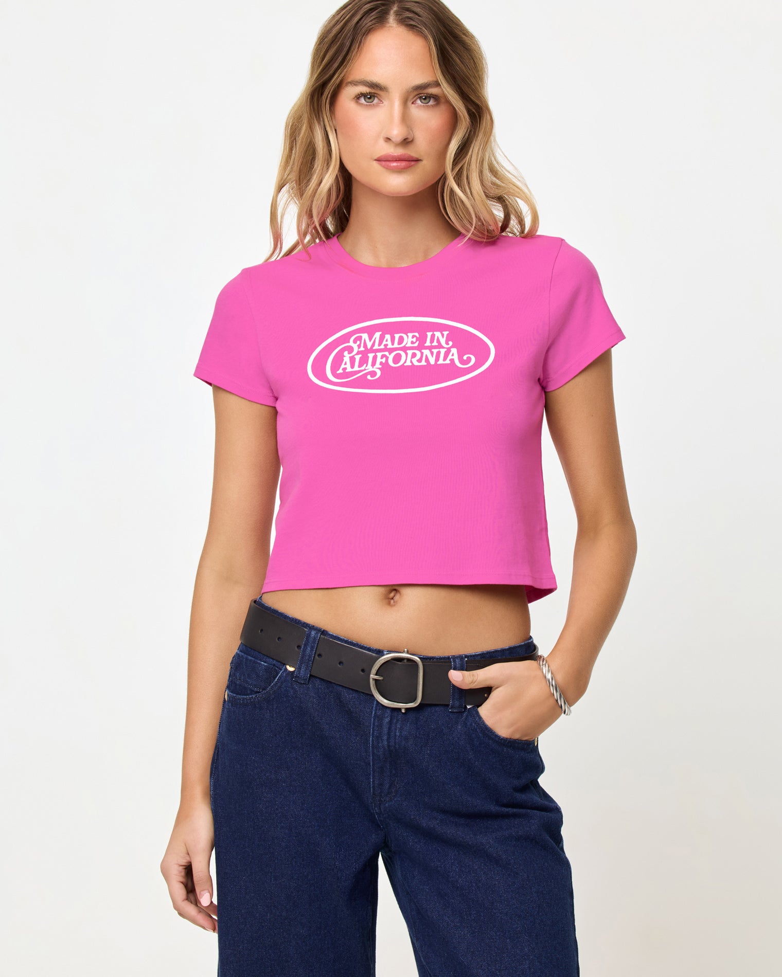 Merci Baby Tee - Made In California Sweetheart Made In California Sweetheart | Badge:New Arrival_#B2AC88_#ffffff'
Front view of model wearing the Merci Baby Tee in Sweetheart Made in California.