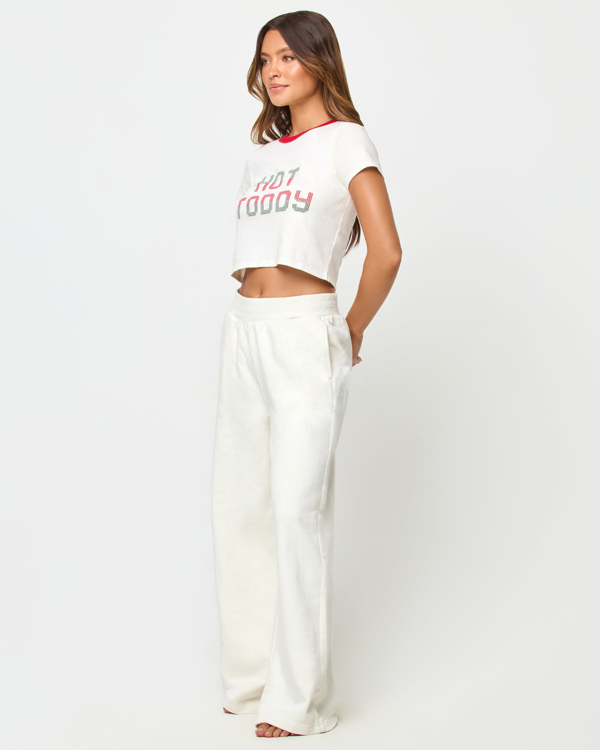 Merci Baby Tee - Hot Toddy LSPACE Merci baby tee in Hot Toddy print, three-quarter view on model.