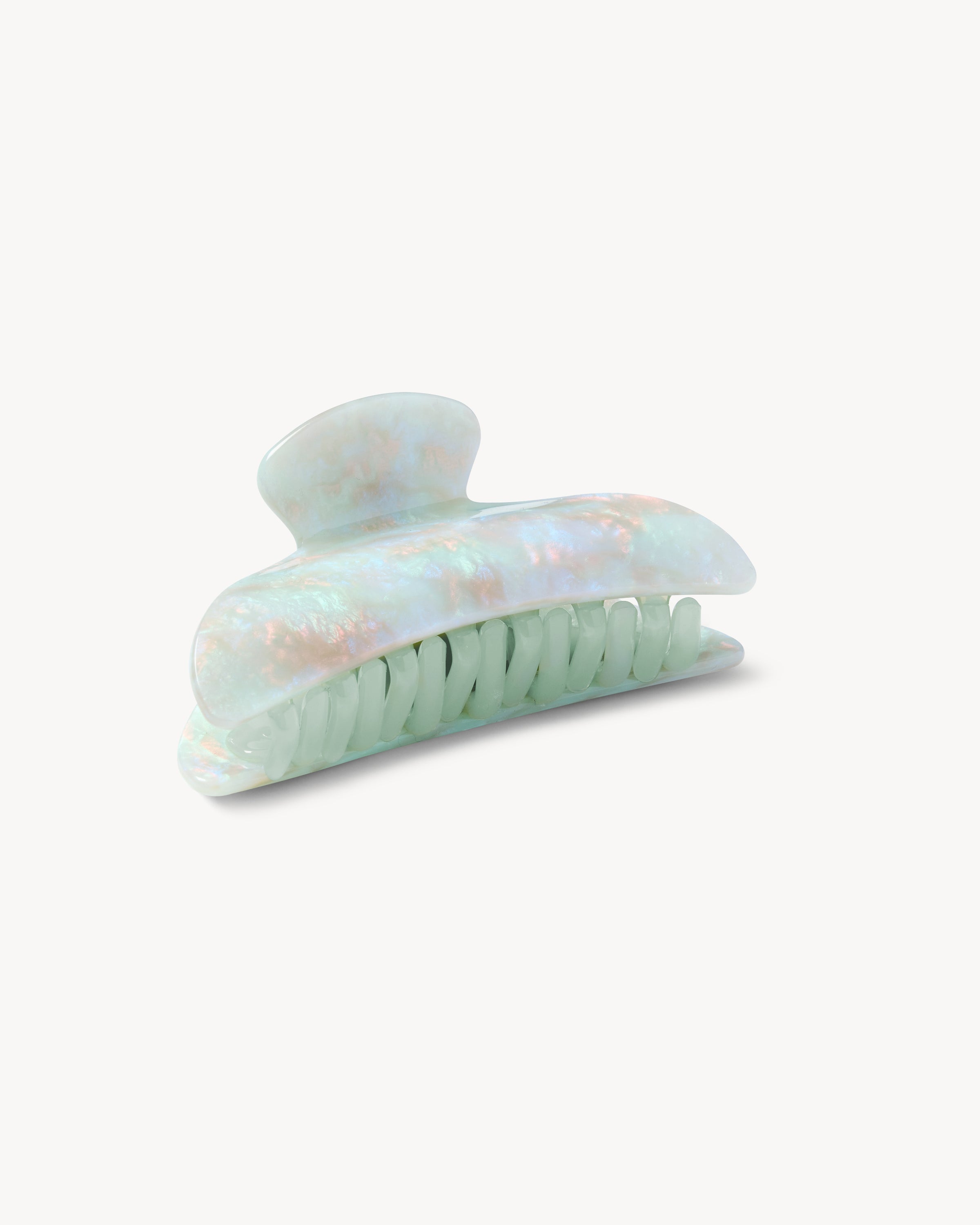 Machete Midi Claw - Astral Mint Off-model angled front view of the Machete Midi Claw in astral mint showing the teeth.