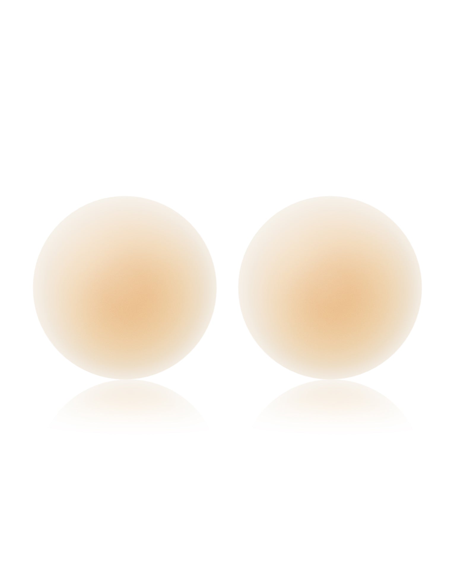 NOOD No Show Adhesive Nipple Covers - Buff Off-model image of two round NOOD No Show Adhesive Nipple Covers in buff on a white background.
