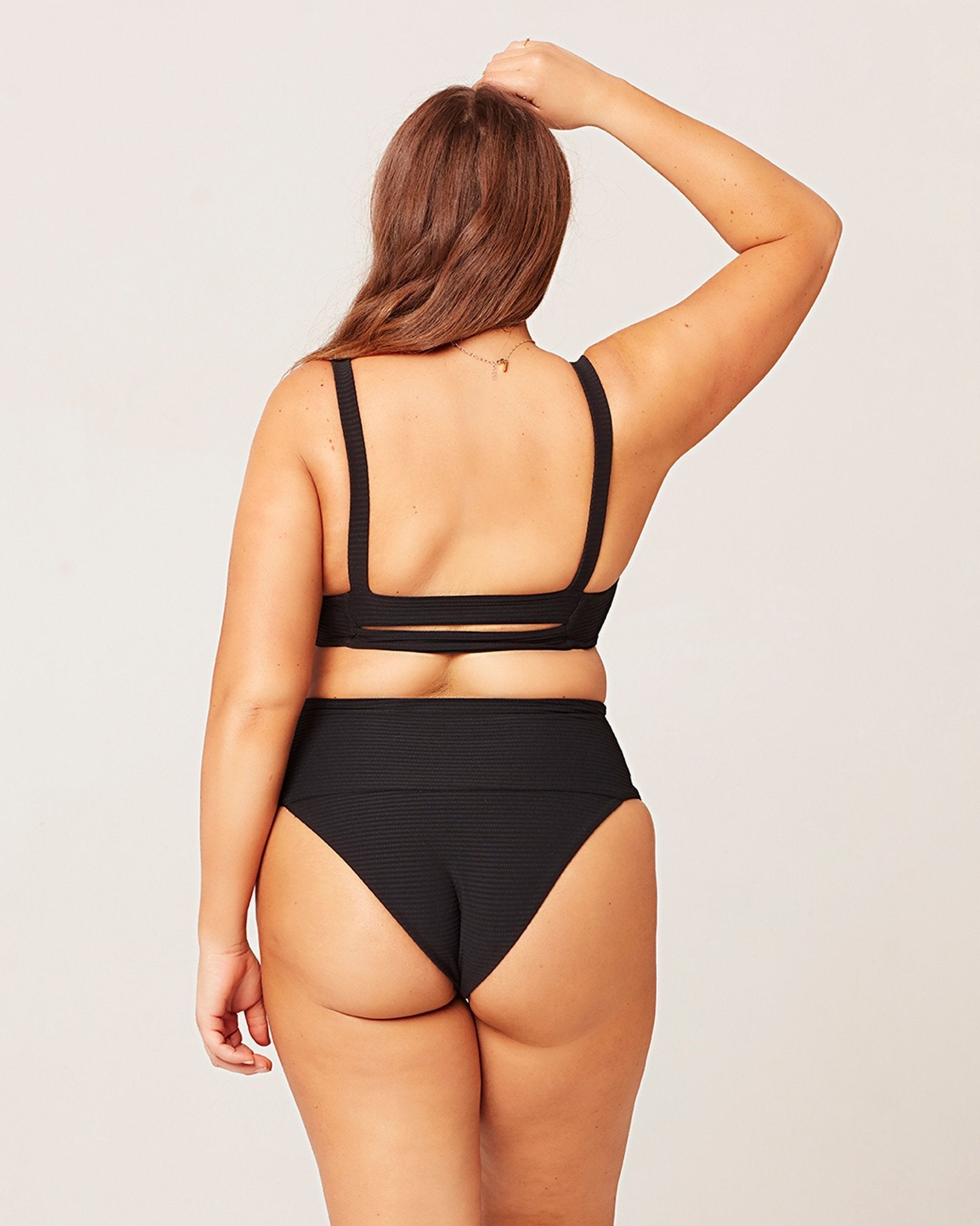 Eco Chic Repreve® Desi Bikini Bottom - Black Black | Model: Ali (size: XL)