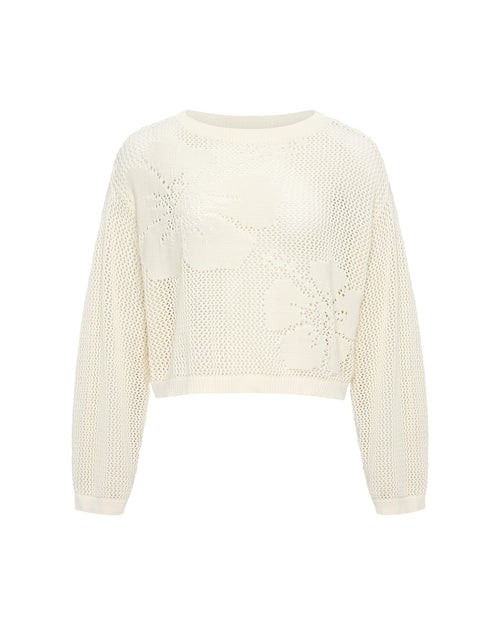 Off-model view of the LSPACE Island Time Sweater in Cream, a cropped open-knit crochet pullover with a floral motif and long sleeves.