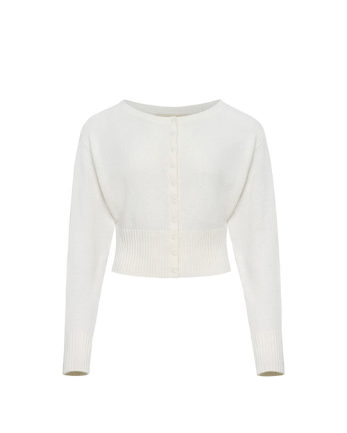 LSPACE In the Moment cardigan in cream, off-model flat lay.