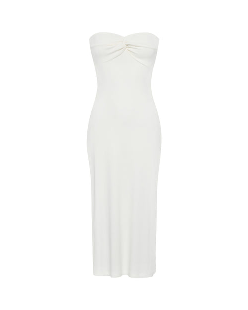 Off-model view of the LSPACE Lisette Dress in cream, featuring a strapless silhouette with a twist detail at the bust and a fitted ribbed midi-length silhouette.
