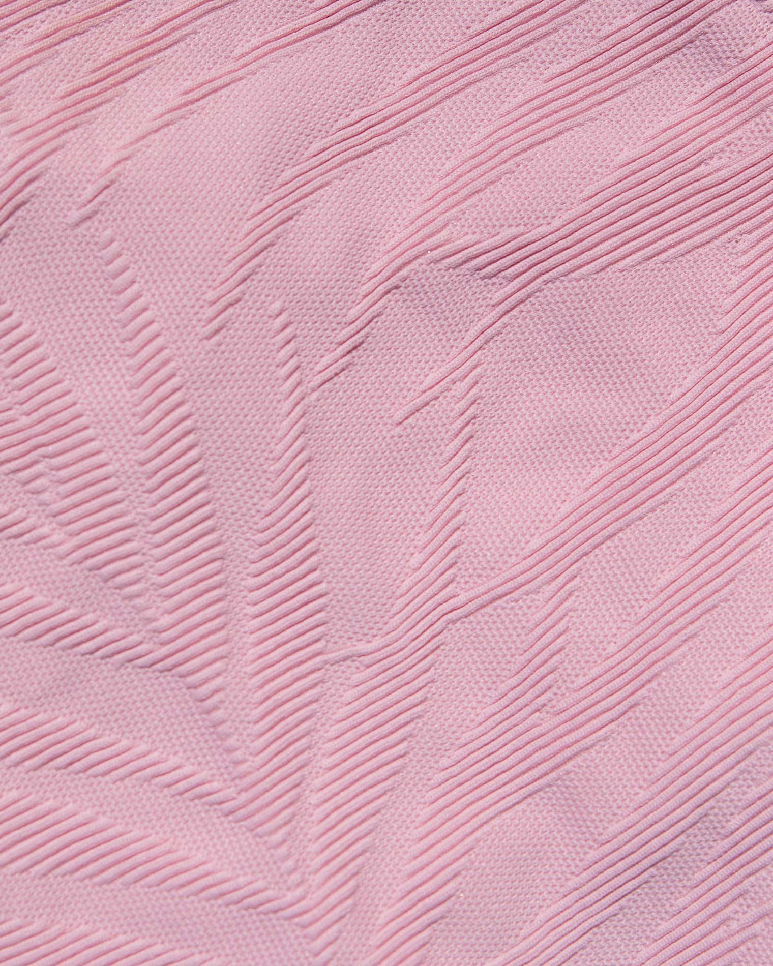 Bardot Bikini Bottom - Pink Sugar A close-up of light pink textured fabric with a raised leaf-like pattern.
