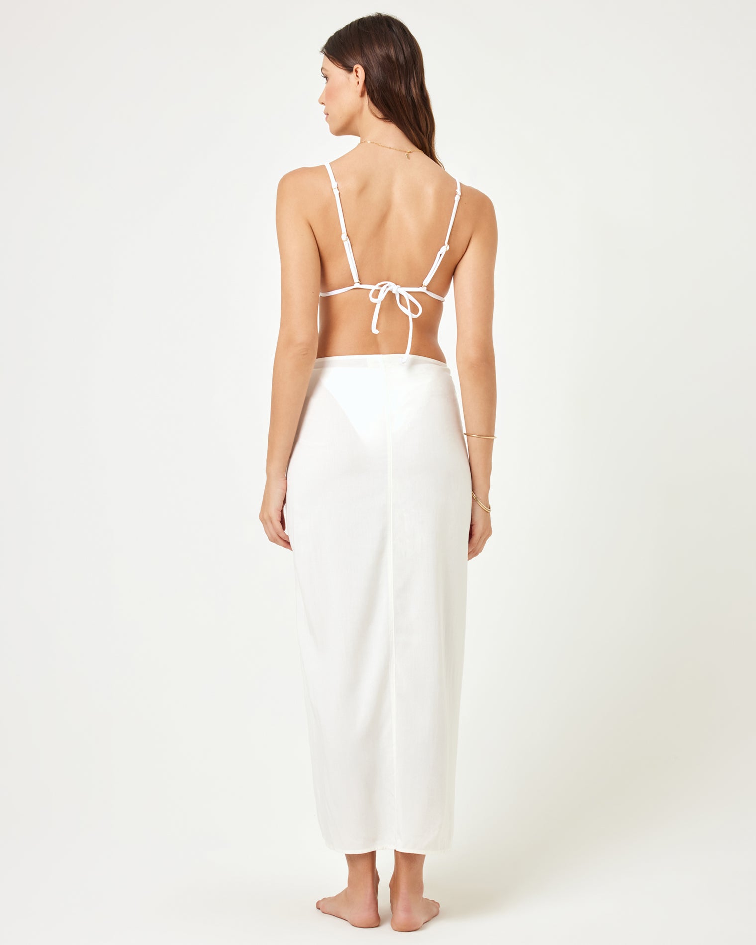 Portela Sarong - Cream LSPACE Portela sarong in cream, back view on model.