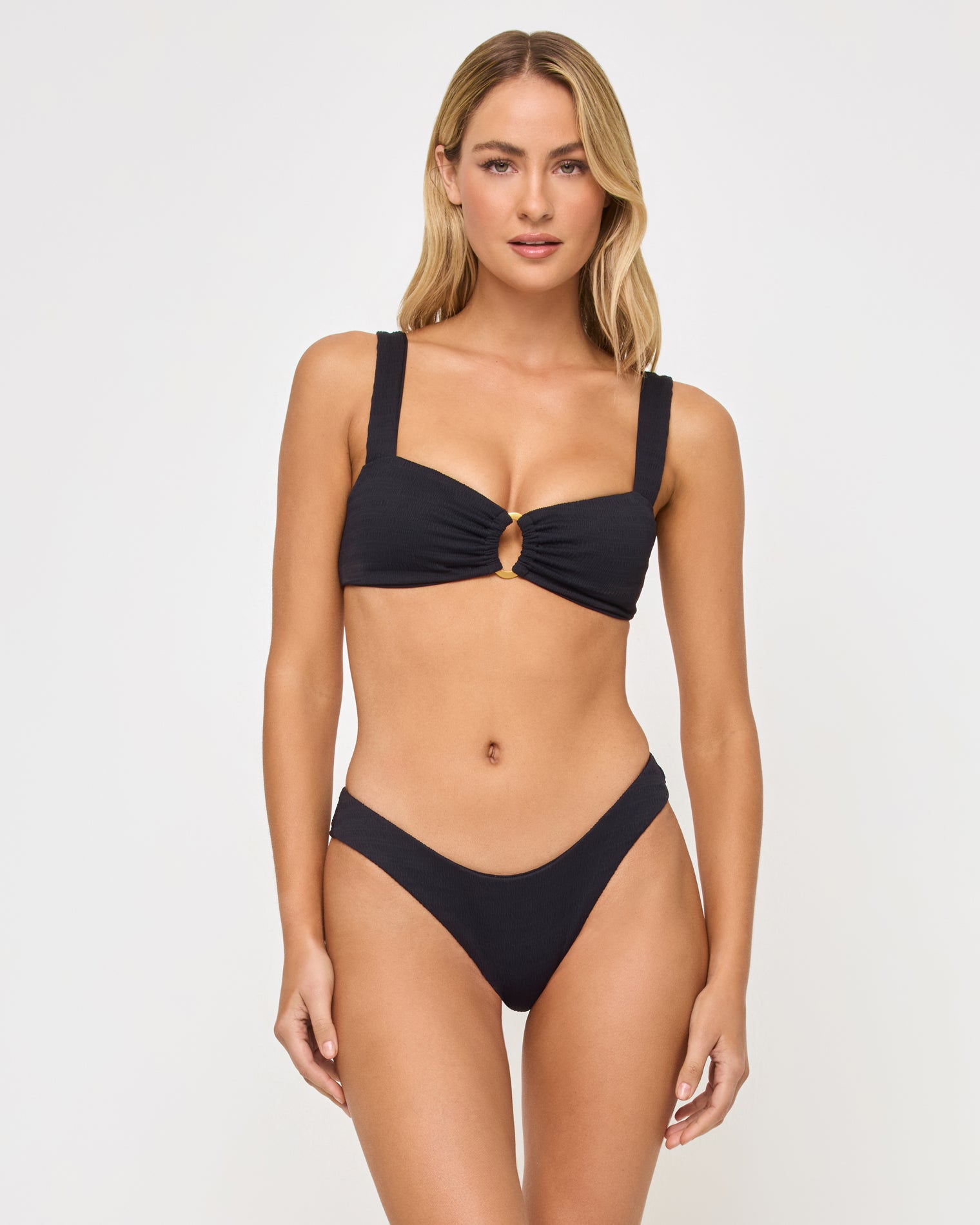 Willow Bikini Top - Black front view of woman wearing a black bikini against a white background