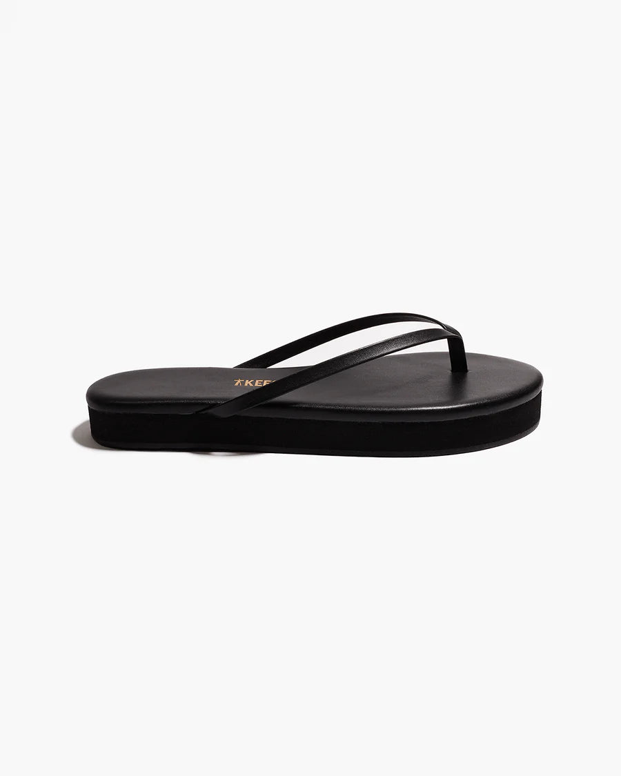 TKEES Lily Platform Sandals - Black Side view of a single black TKEES Lily Platform Sandal showing the platform heel height.