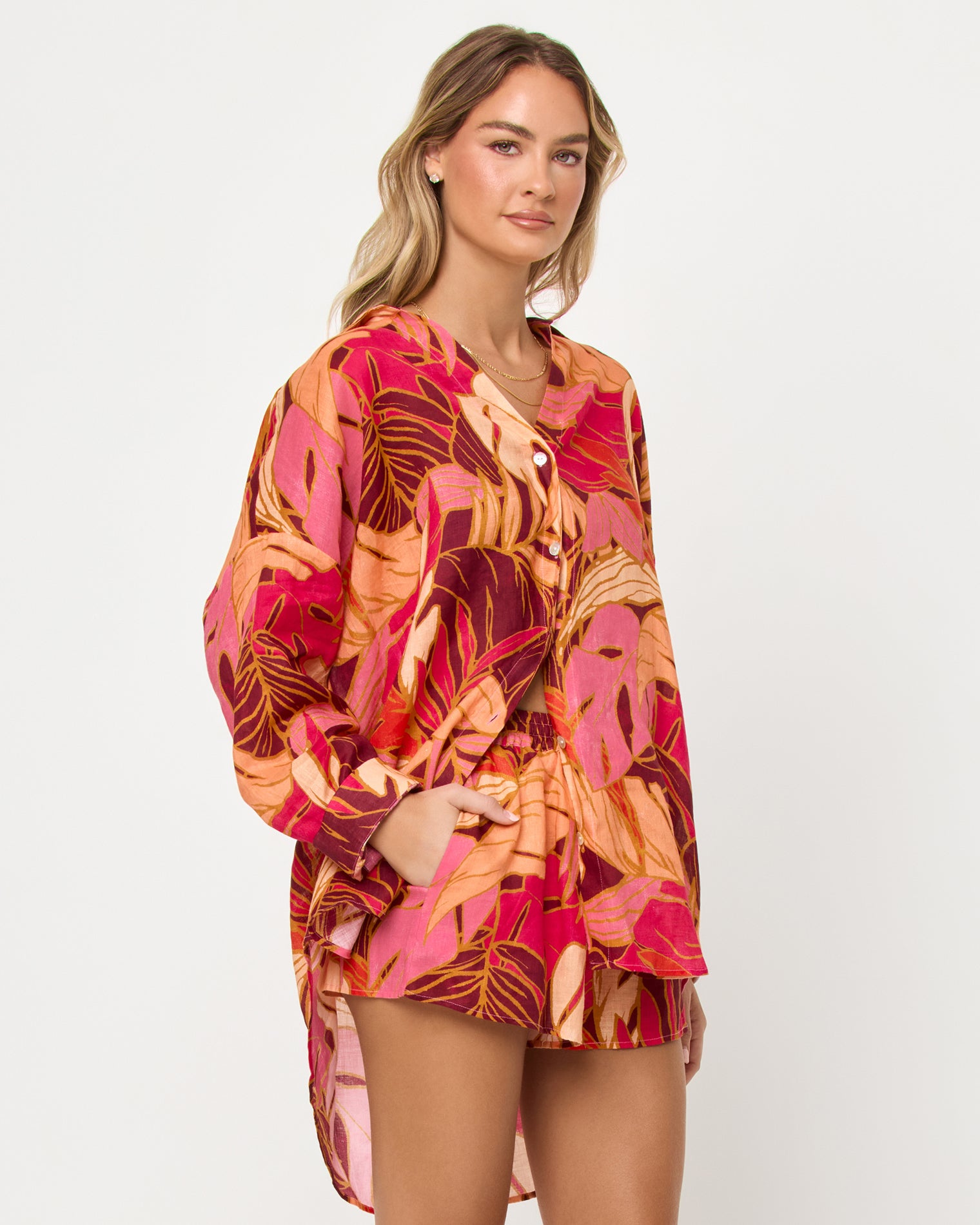 Rio Tunic - Leaf It To Me Side view of model wearing the LSPACE Rio Tunic in leaf it to me.