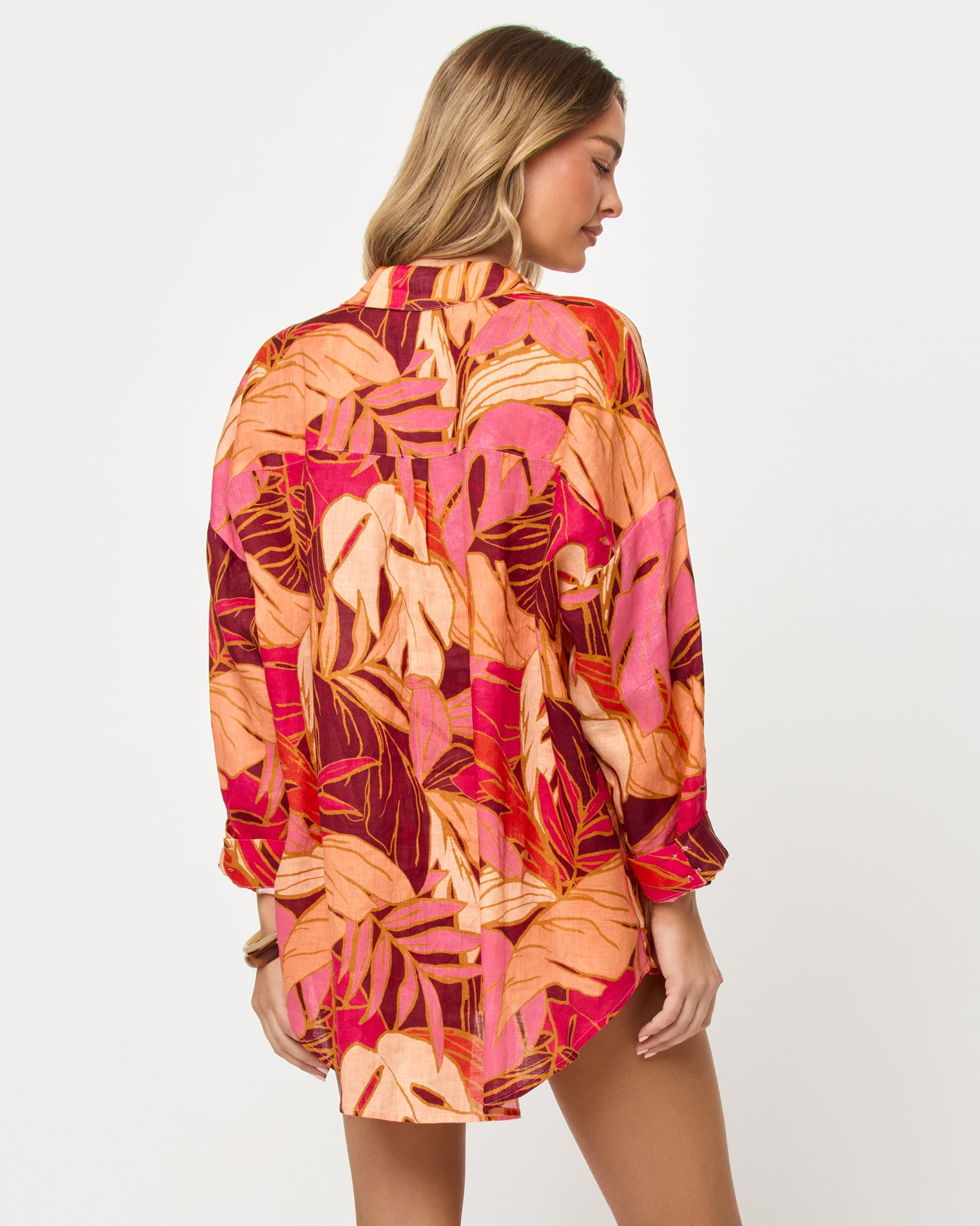 Rio Tunic - Leaf It To Me Back view of model wearing the LSPACE Rio Tunic in leaf it to me, a leaf-print tunic coverup.