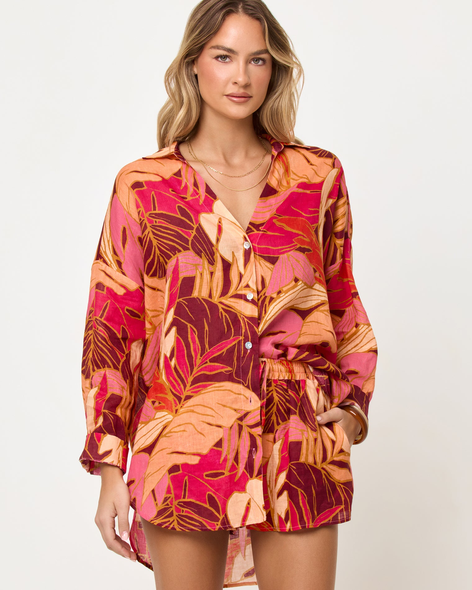 Rio Tunic - Leaf It To Me Close-up front view of model wearing the LSPACE Rio Tunic in leaf it to me showing the leaf print and fabric detail.