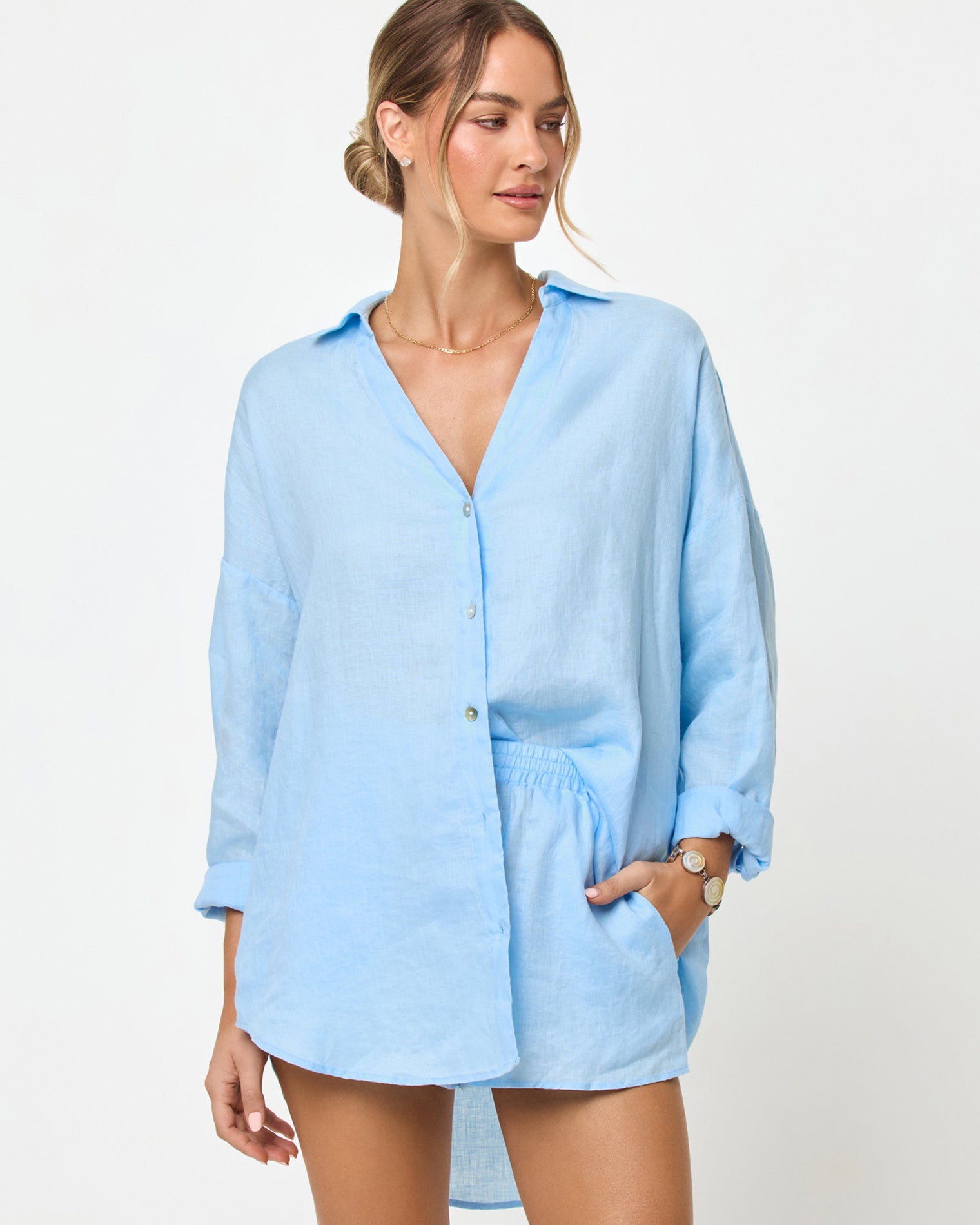 Rio Short - Sky Blue Sky Blue | Badge:New Arrival_#B2AC88_#ffffff'
LSPACE Rio tunic and short in Sky Blue, three-quarter view on model.