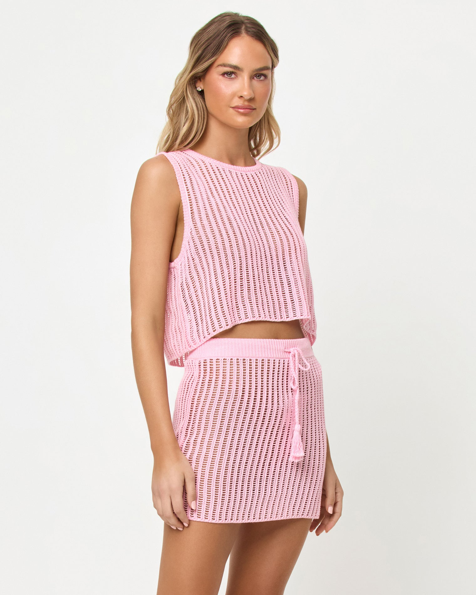 Sander Top - Rosewater LSPACE Sander Top and Skirt in Rosewater, three-quarter front view on model.