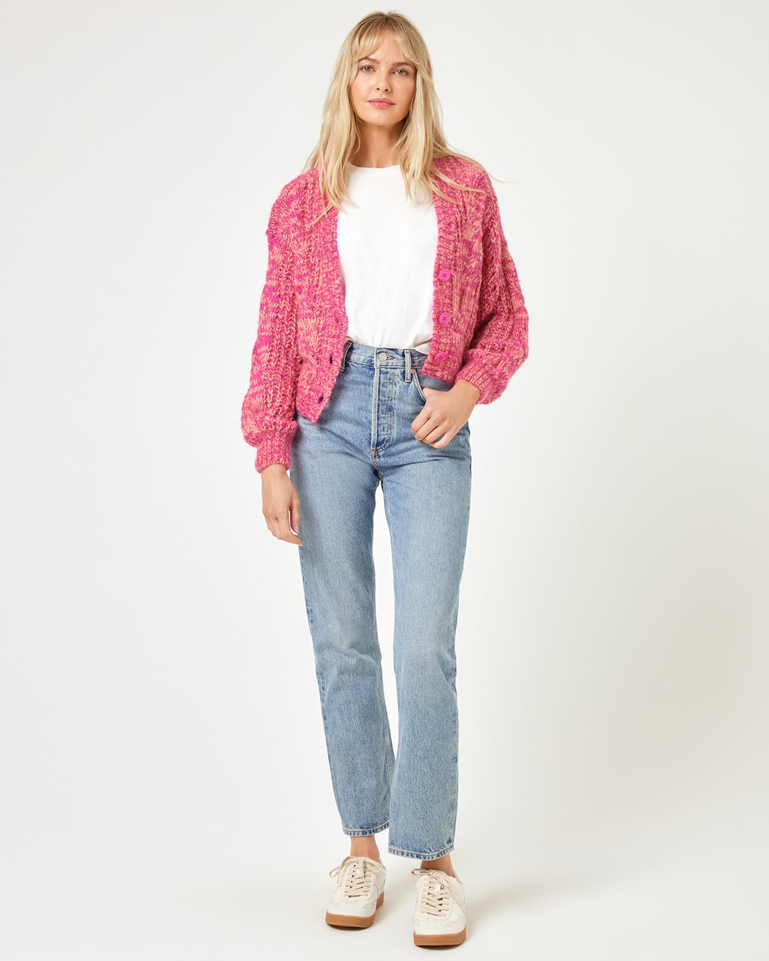 Strawberry Fields Cardigan - Strawberry Marl Full-length front view of a model wearing the LSPACE Strawberry Fields Cardigan in strawberry marl, styled open over a white tee with jeans and sneakers on a white background.