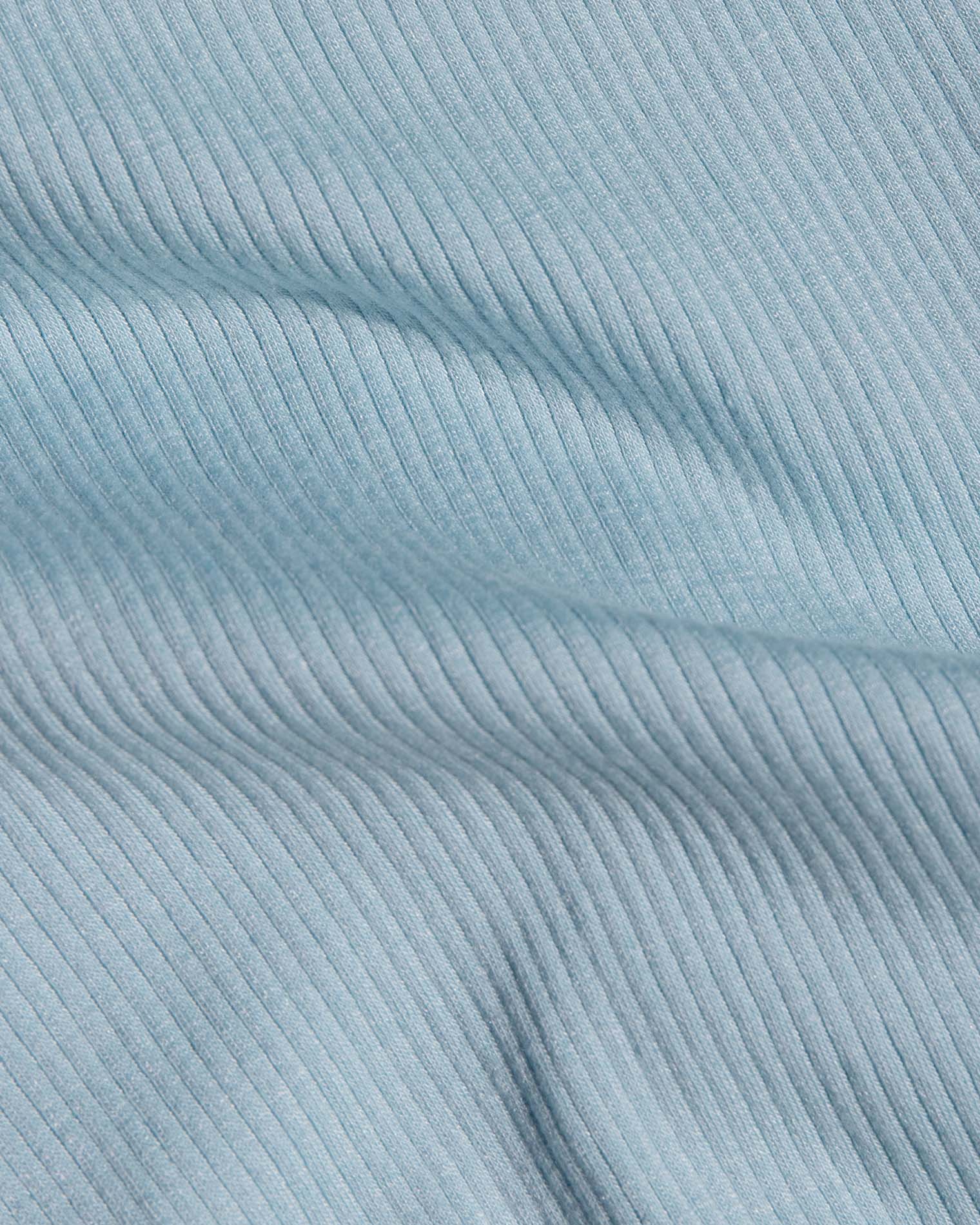 Shea Maxi Dress - Sky Blue Cream A close-up of light blue ribbed fabric.