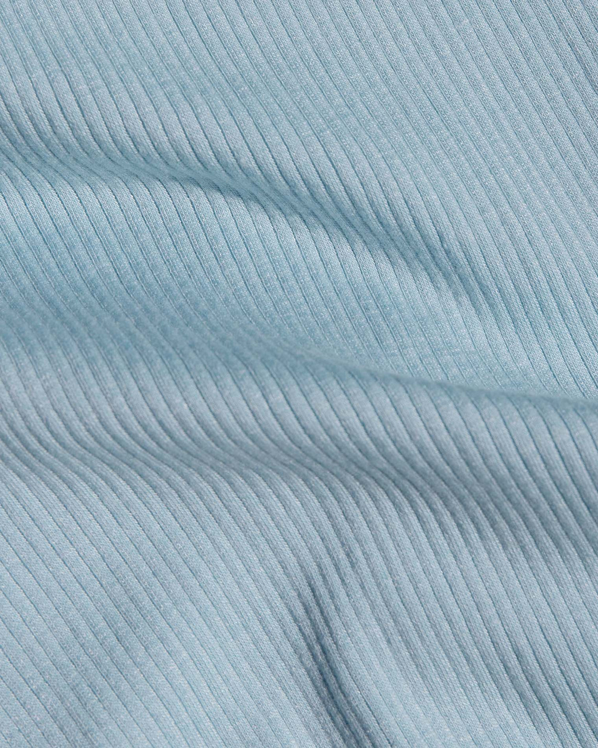 Shea Maxi Dress - Sky Blue Cream A close-up of light blue ribbed fabric.