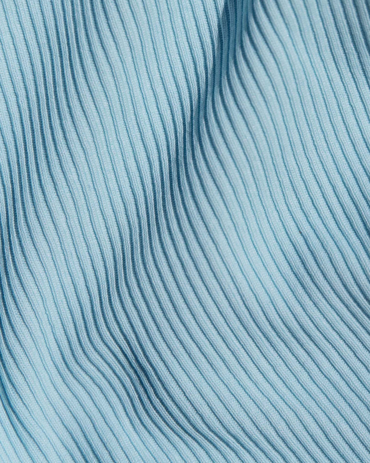 Daria Bikini Top - Sky Blue Cream A close-up of a light blue ribbed knit fabric.