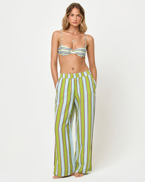 
LSPACE Sur Pant in Comporta Cool Girl print, front view on model with matching bikini top.