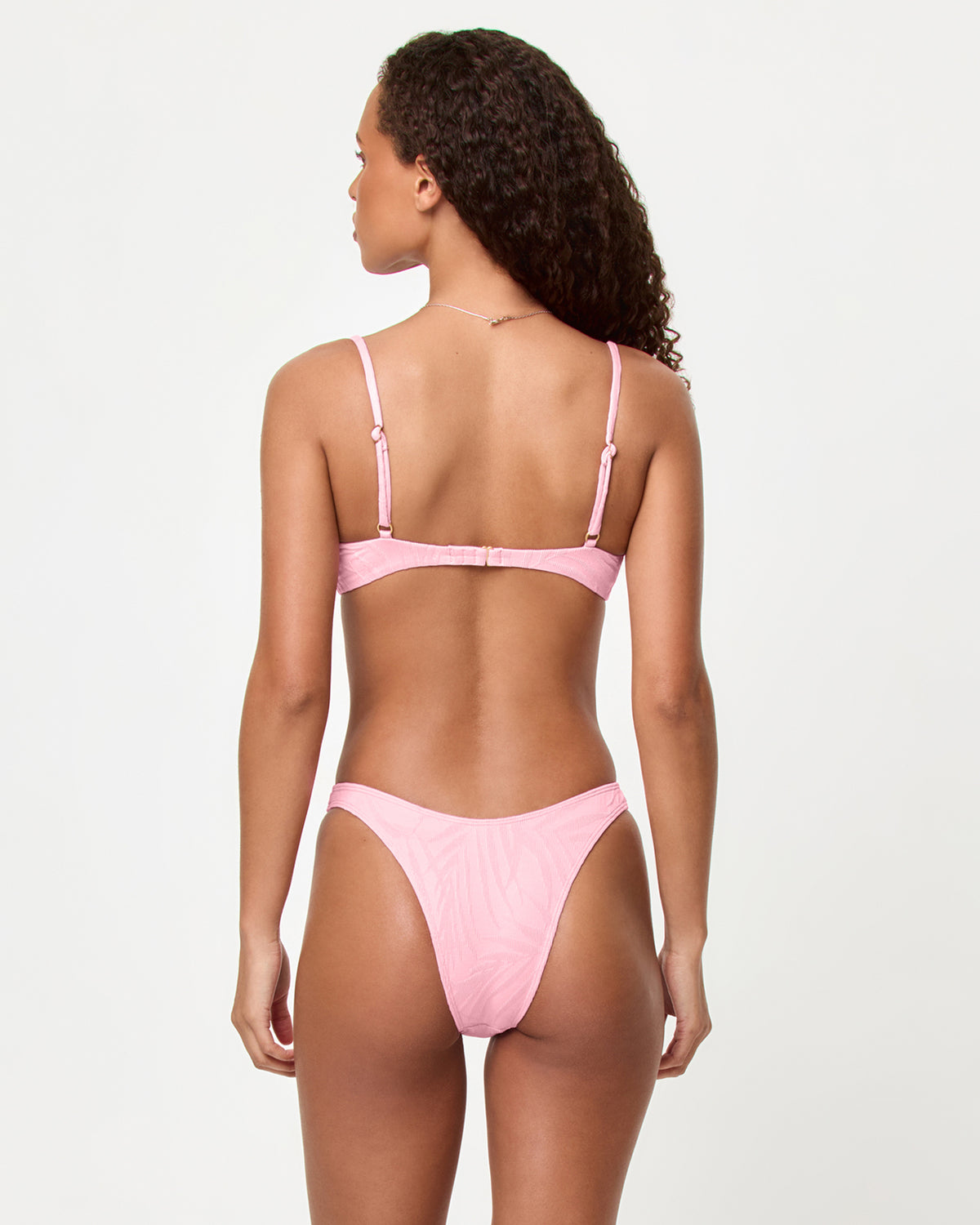 Belle Bikini Top - Pink Sugar LSPACE Belle bikini top and Donnie bikini bottom in Pink Sugar, back view on model.