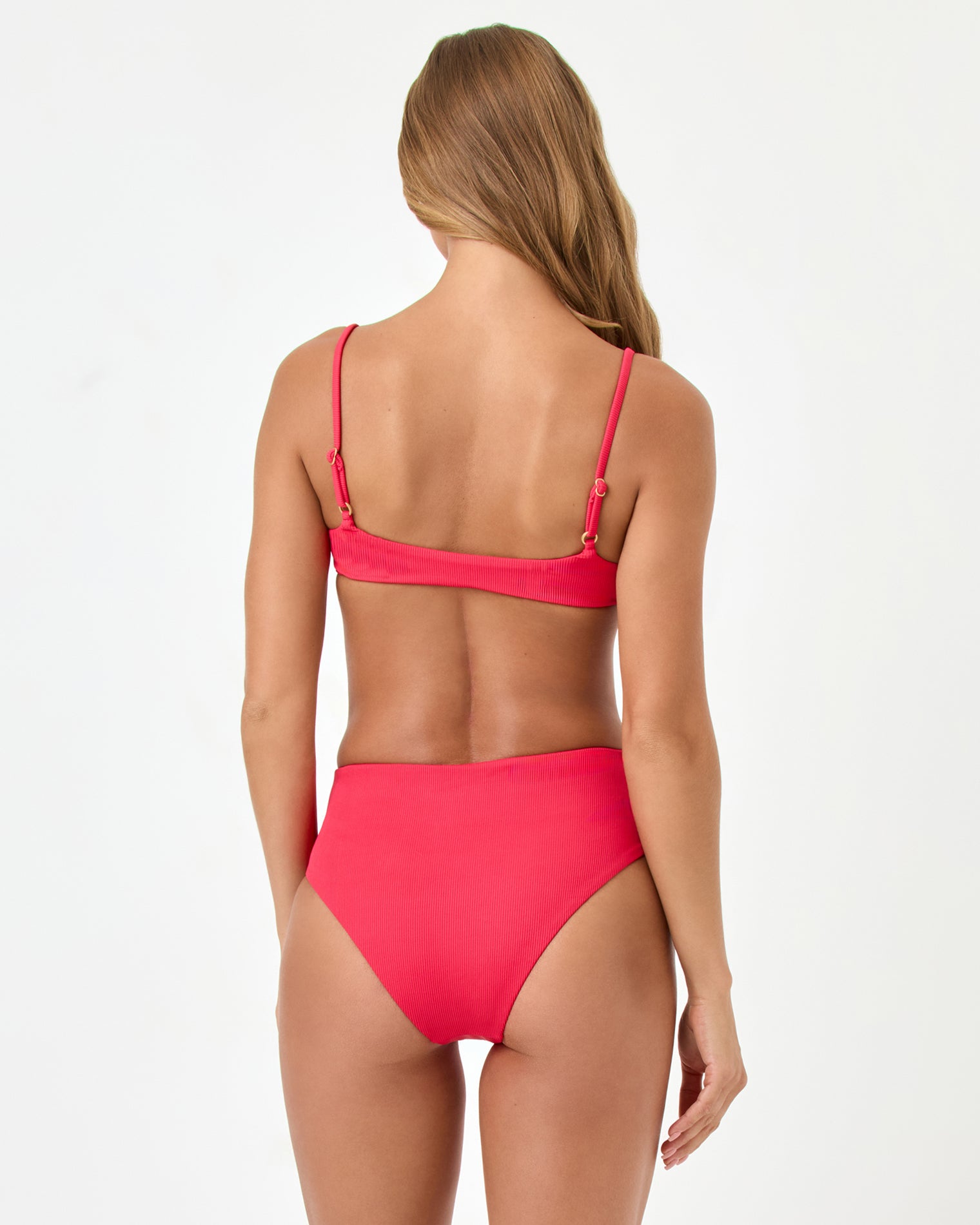 Presley Bikini Top - Pout Back view of a model wearing the LSPACE Pout Presley Bikini Top with adjustable straps and gold ring hardware, styled with the matching Soleil Bikini Bottom.