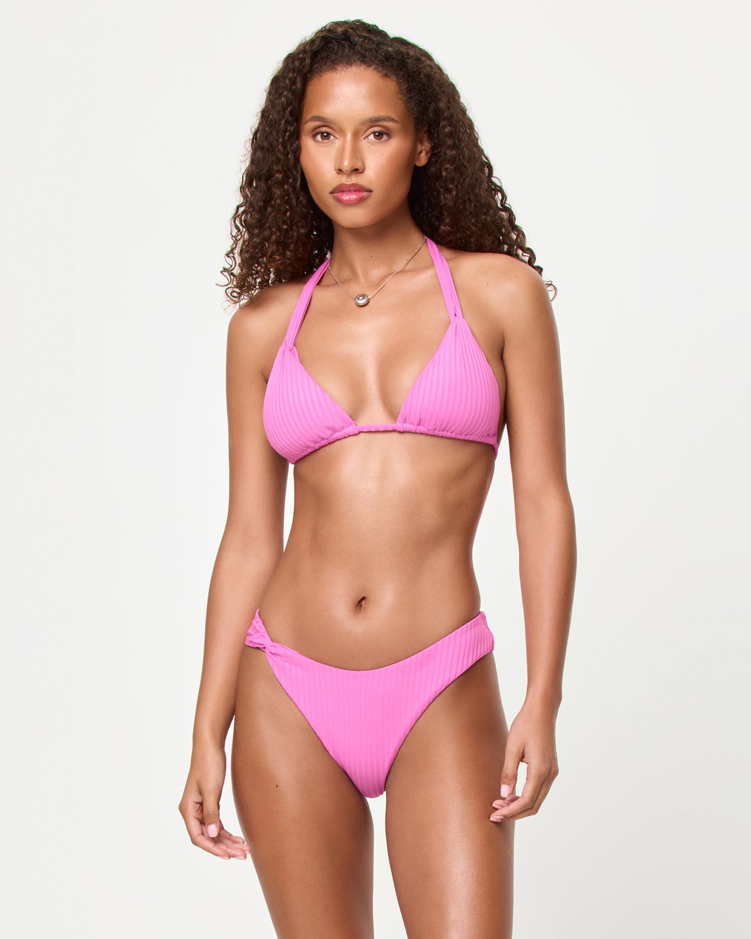 Chrissy Bikini Bottom - Sweetheart Front view of a model wearing the LSPACE Sweetheart Kami Bikini Top with ribbed triangle silhouette and halter strap, paired with the Chrissy Bikini Bottom.
