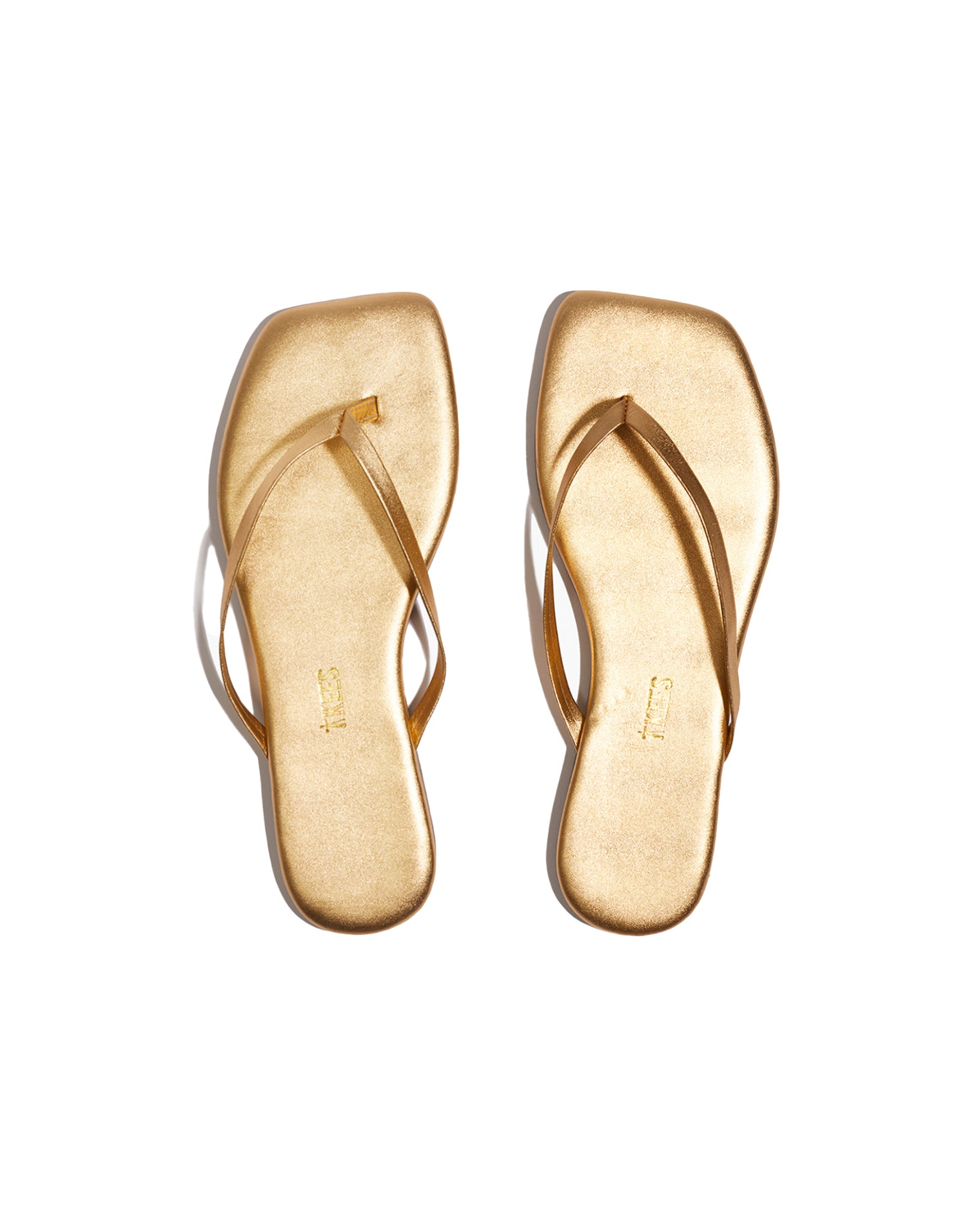 TKEES Square Toe Lily Sandals - Blink Top view of the TKEES Square Toe Lily Sandals in blink, showing gold metallic square-toe sandals with a thin thong strap.
