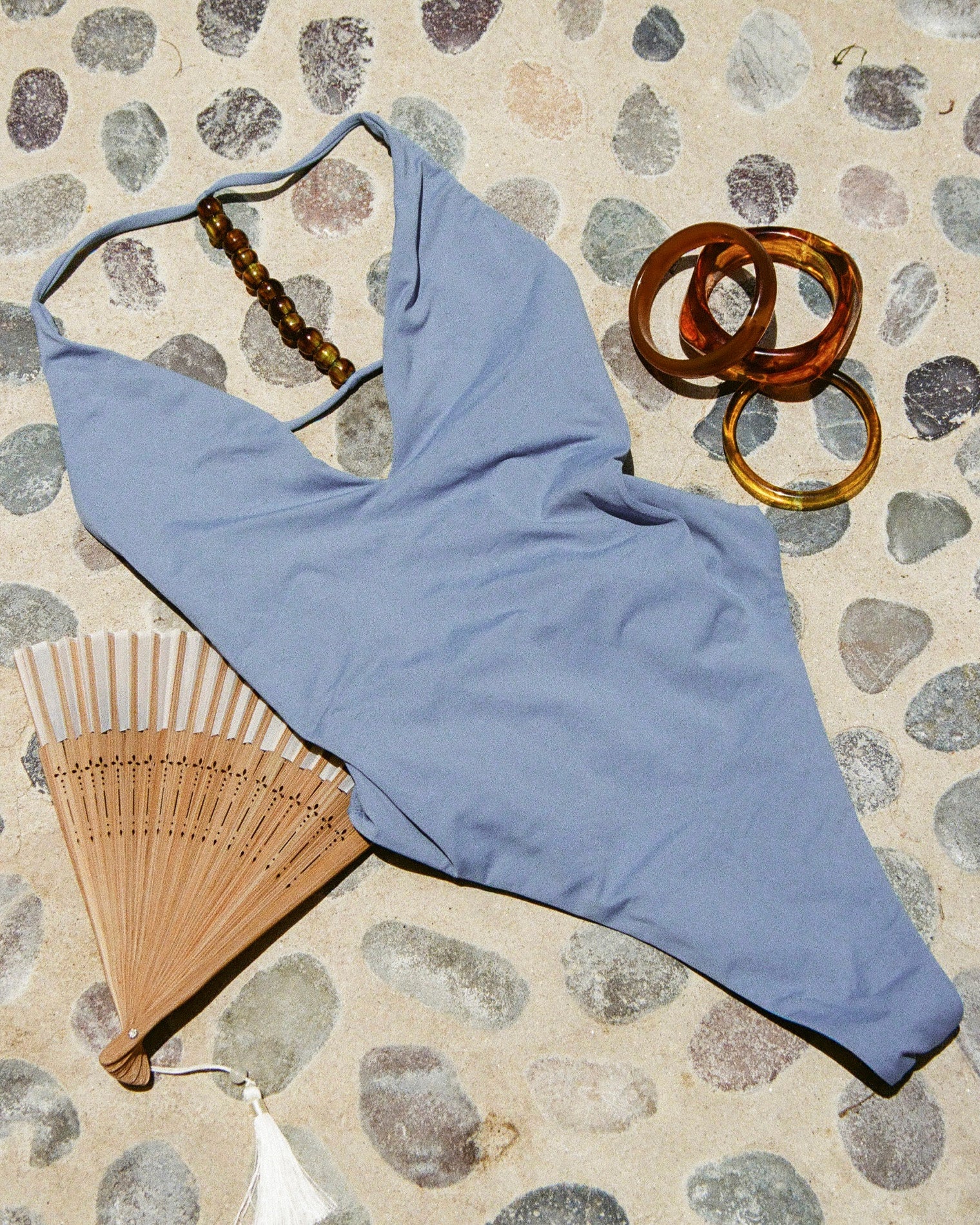 Blue one piece swimsuit with beads