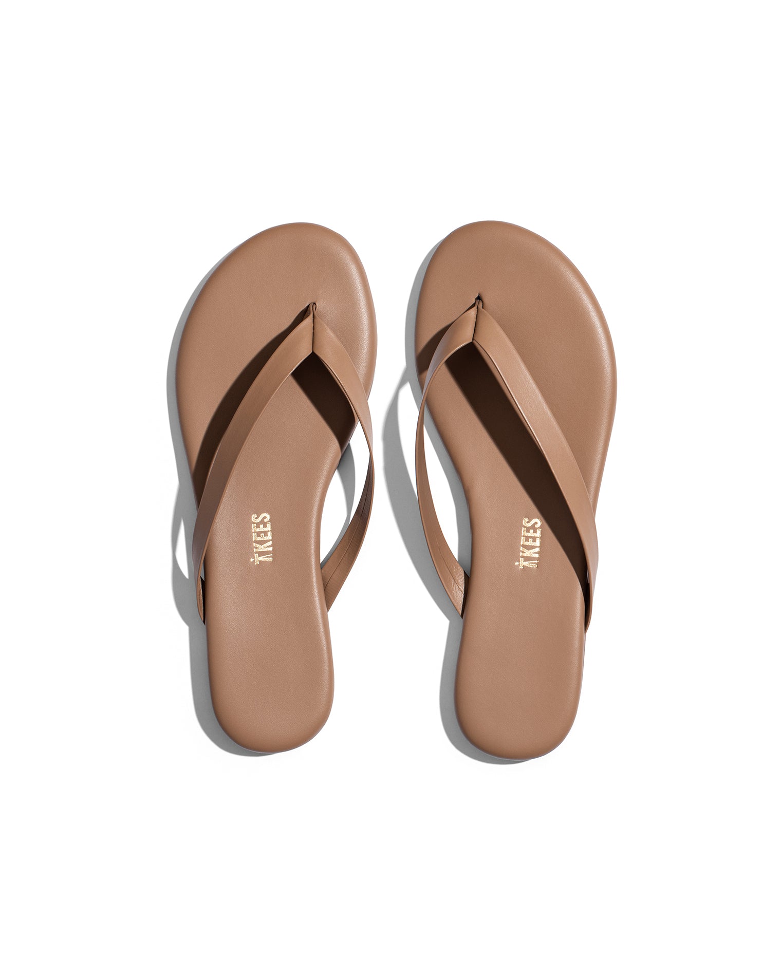 TKEES Boyfriend Sandals - Beach Bum Top view of the TKEES Boyfriend Sandals in beach bum, showing a pair of flat thong sandals with a thin strap and round toe in warm tan.